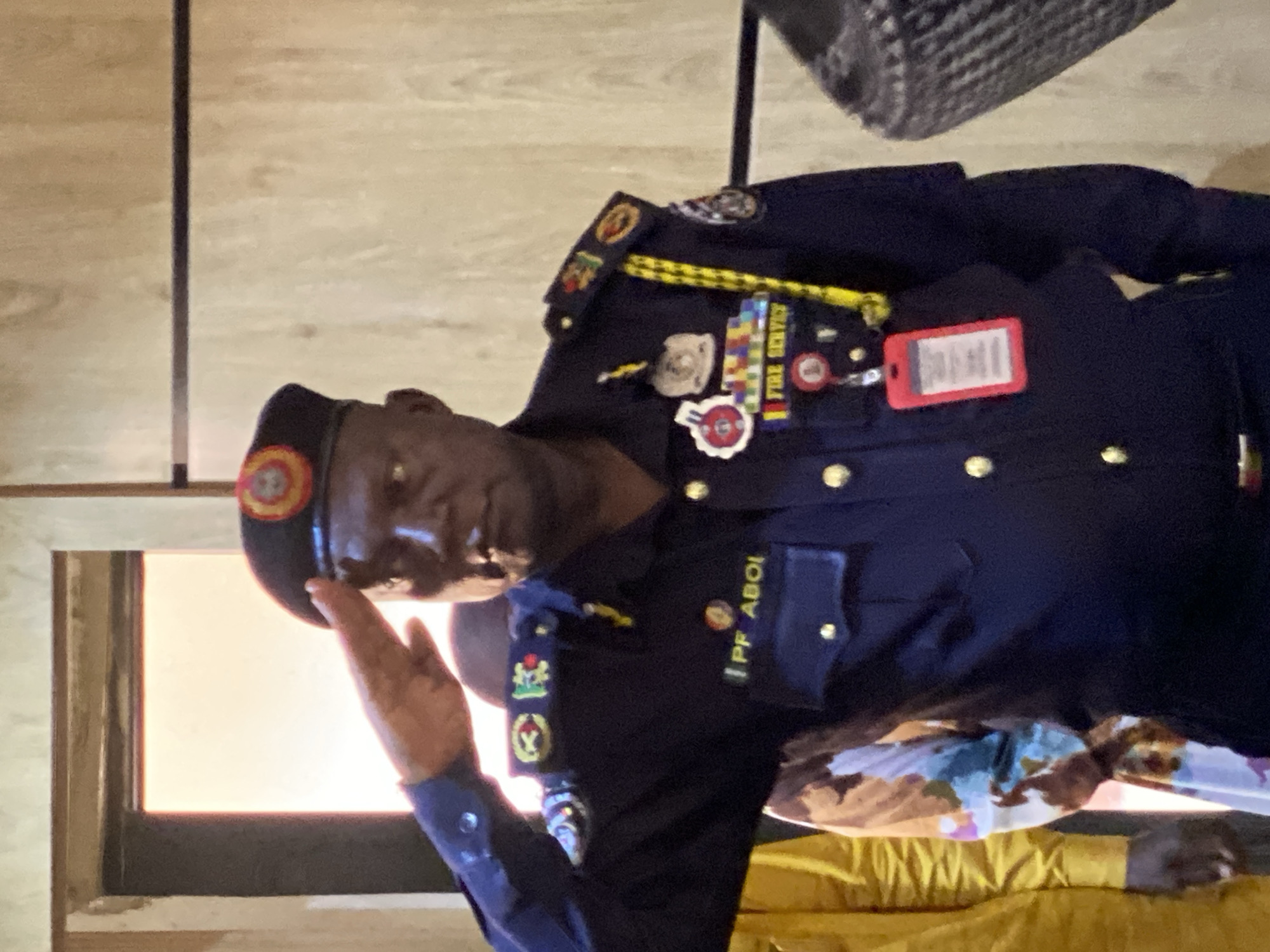 Official gathering with fire service personnel documented in Shaba