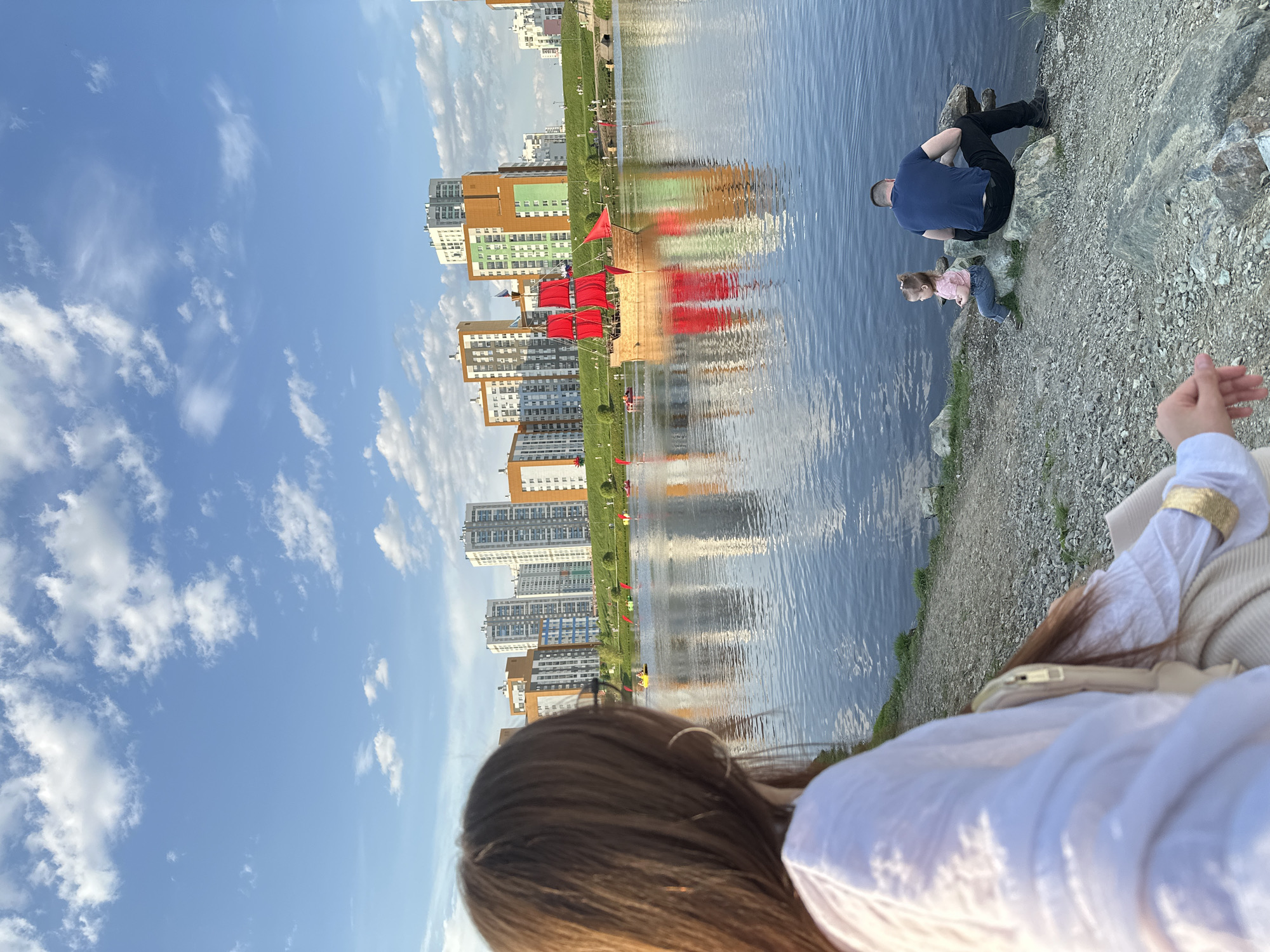 Woman and child photographed near waterfront in Yekaterinburg