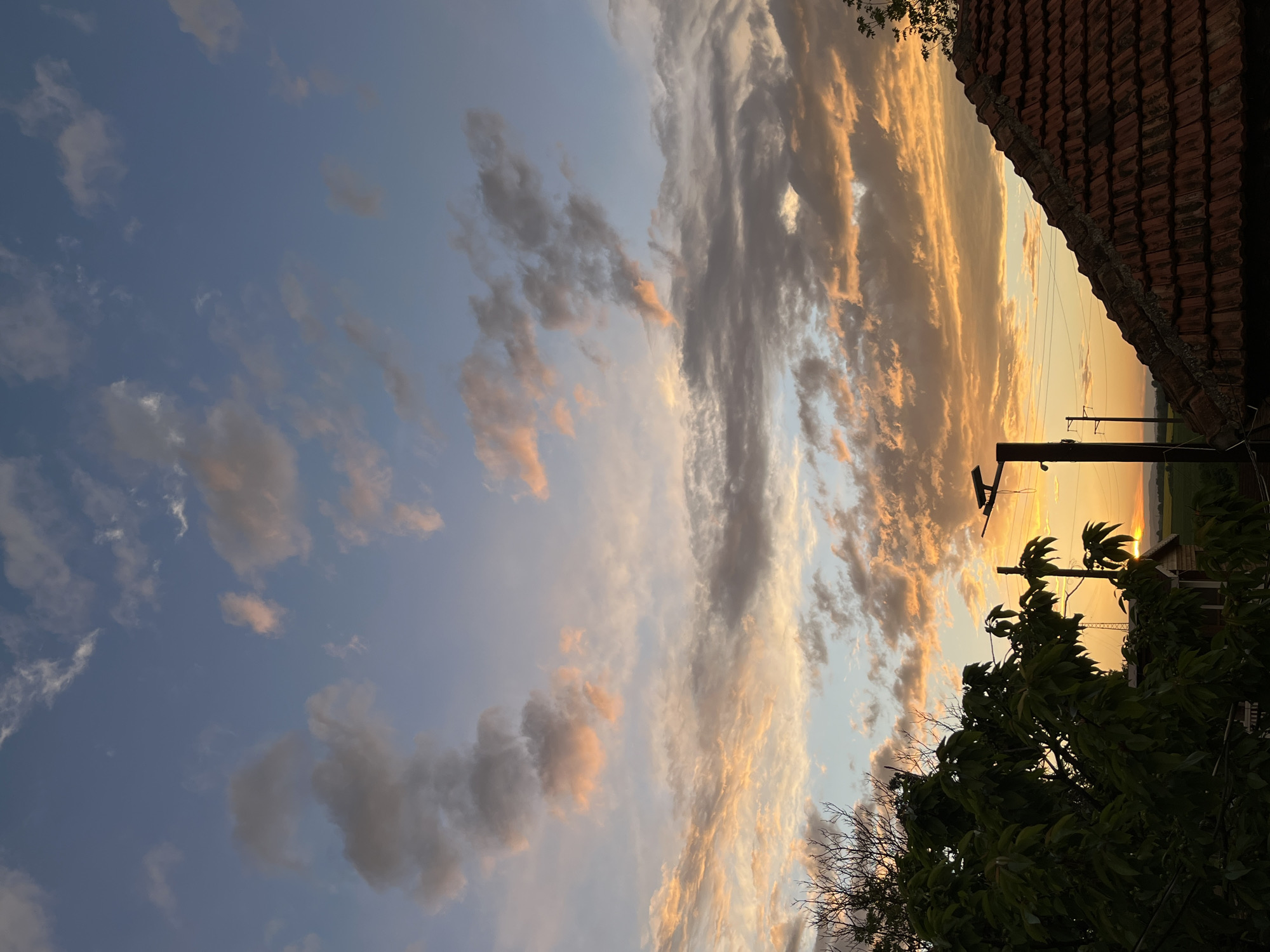 Evening sunset documented over rural Pchelnik, Bulgaria village landscape