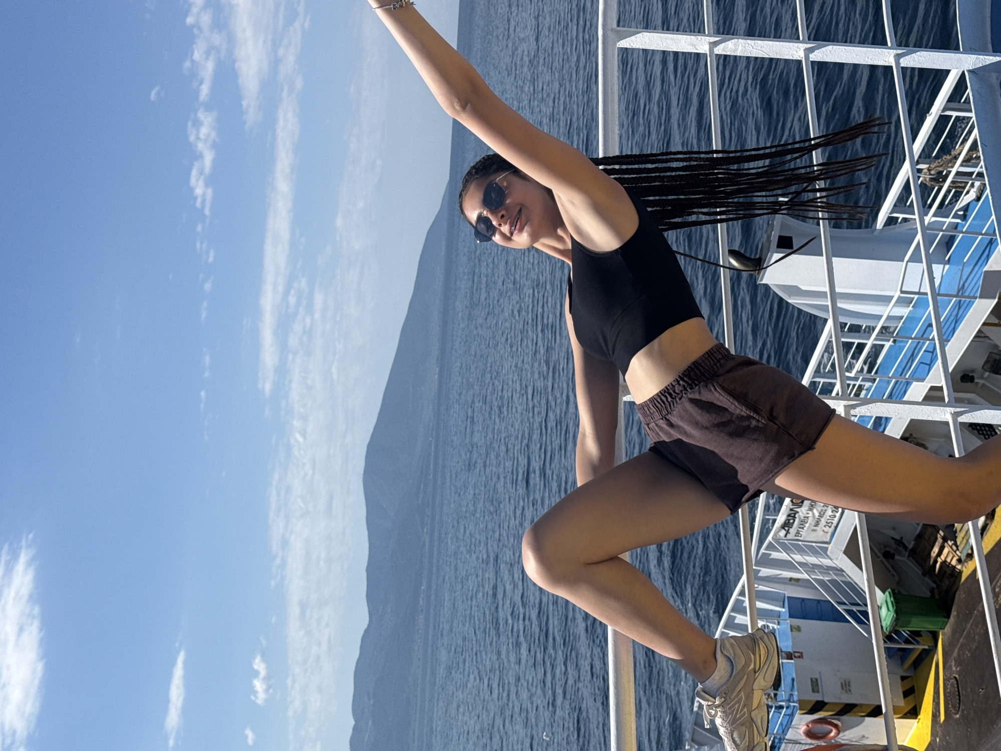 Ferry ride through Greek coastal waters, mid-morning.