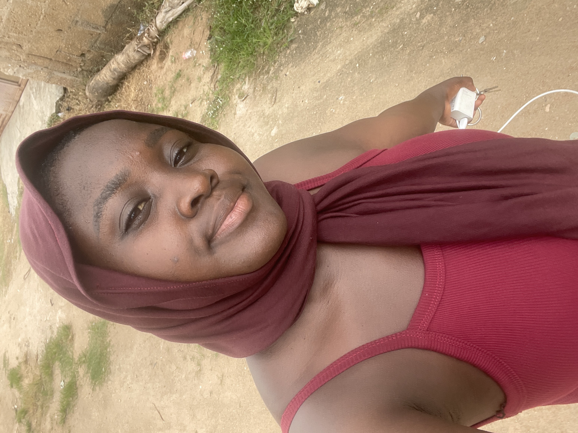 Portraits and power lines in Howayi, Nigeria