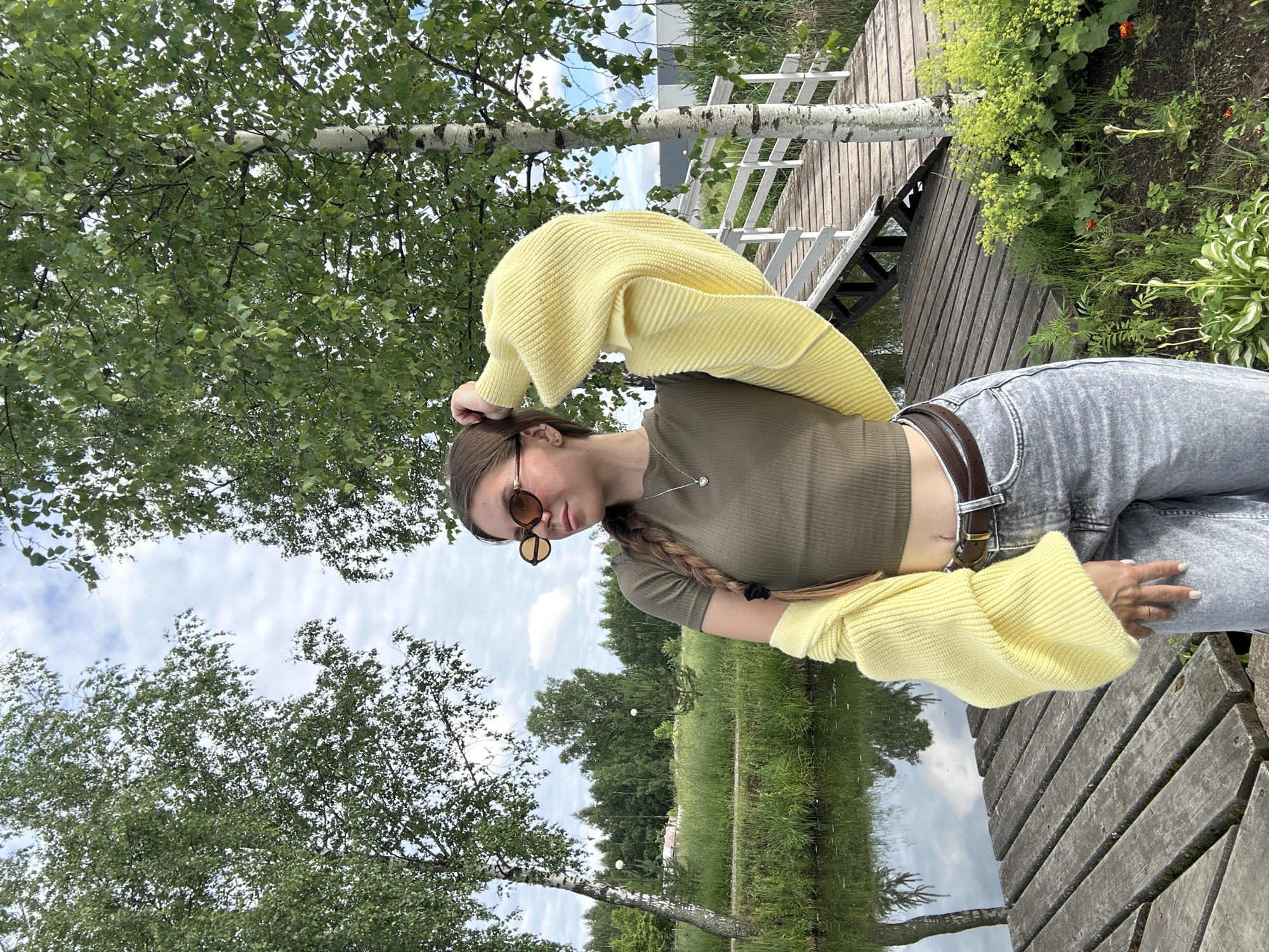 Family outing at lakeside park with chapel in Klin