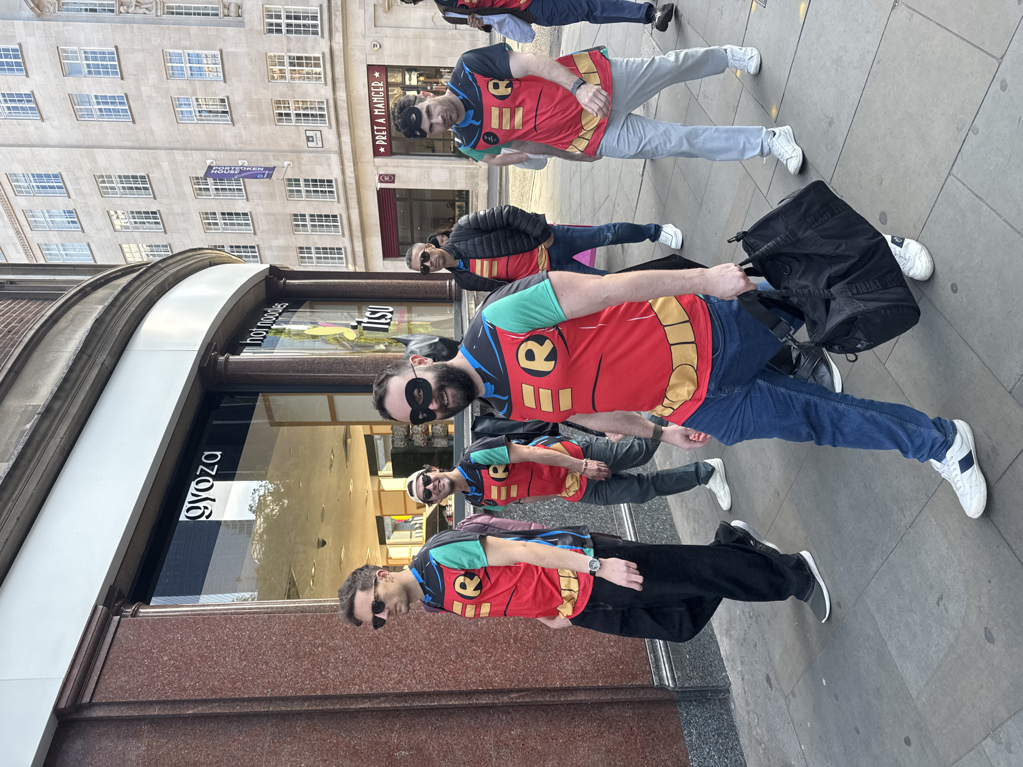 Five Robin costumed figures spotted walking London streets