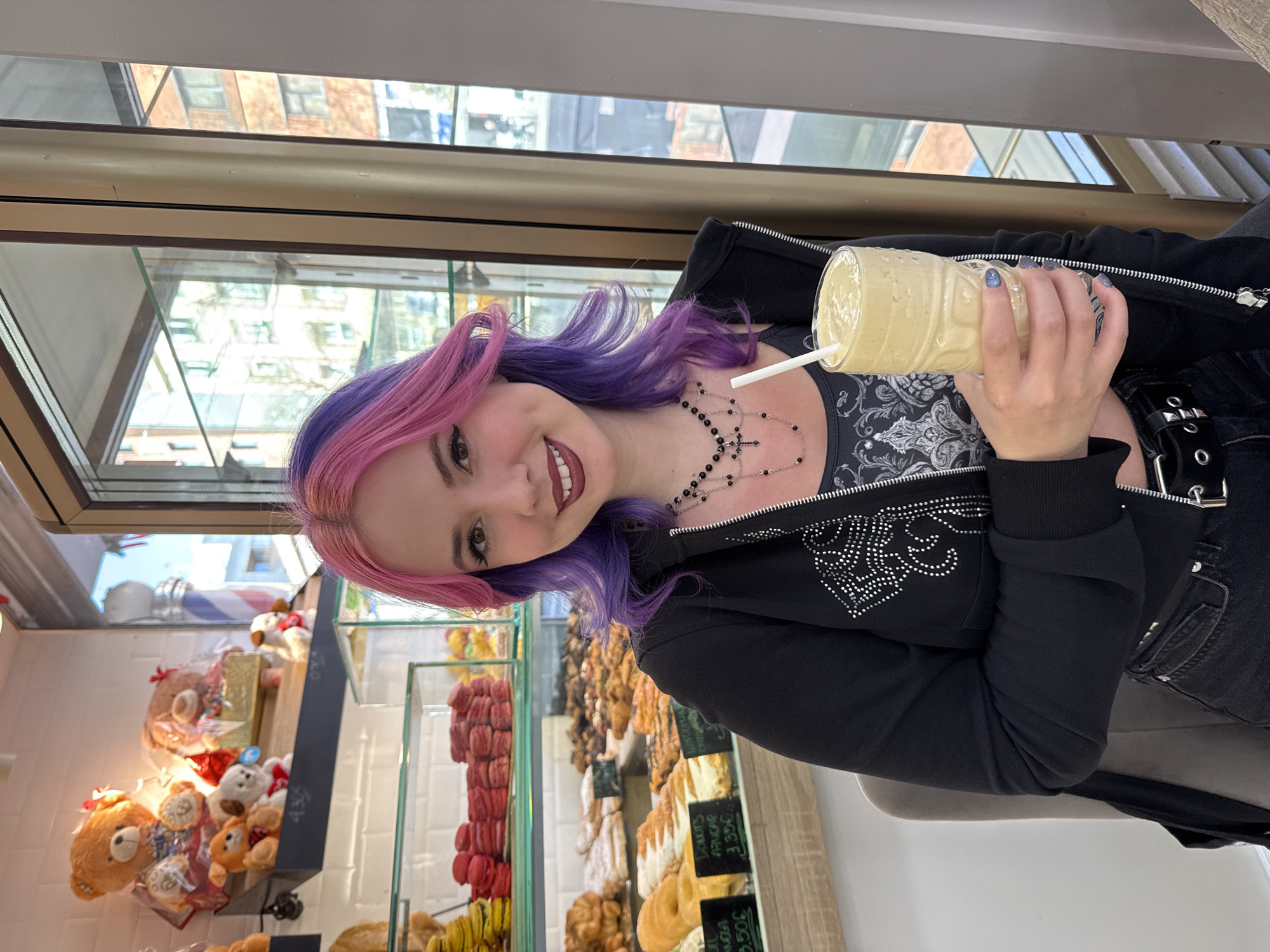 Woman with colorful hair spotted with beverage in Madrid