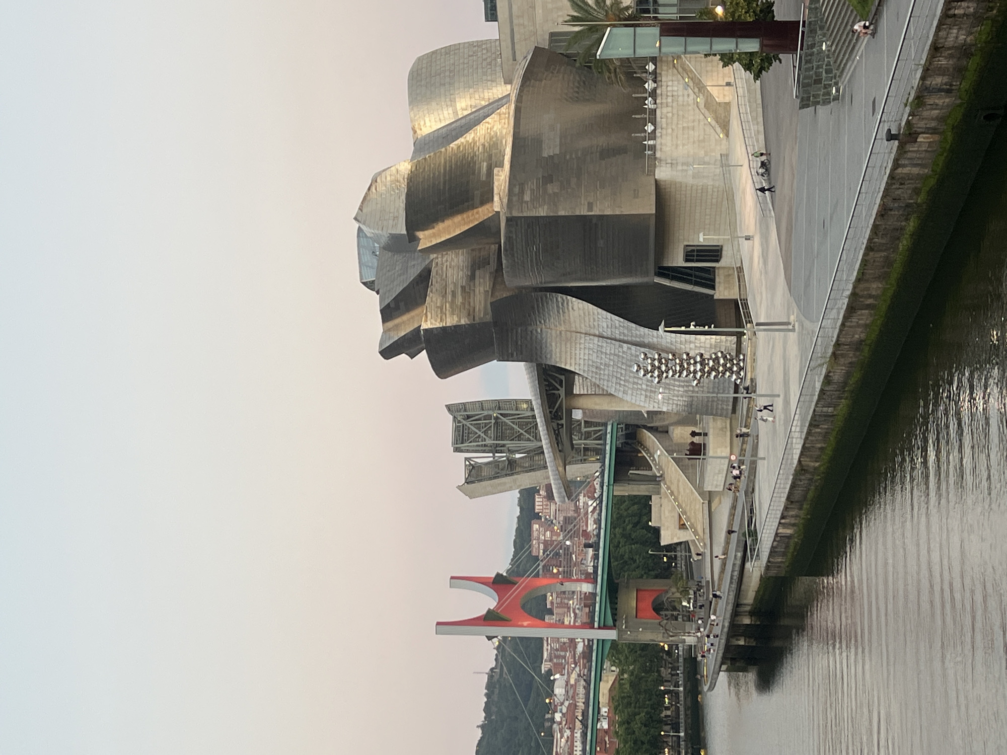 Evening stroll along Bilbao's Nervión riverbank