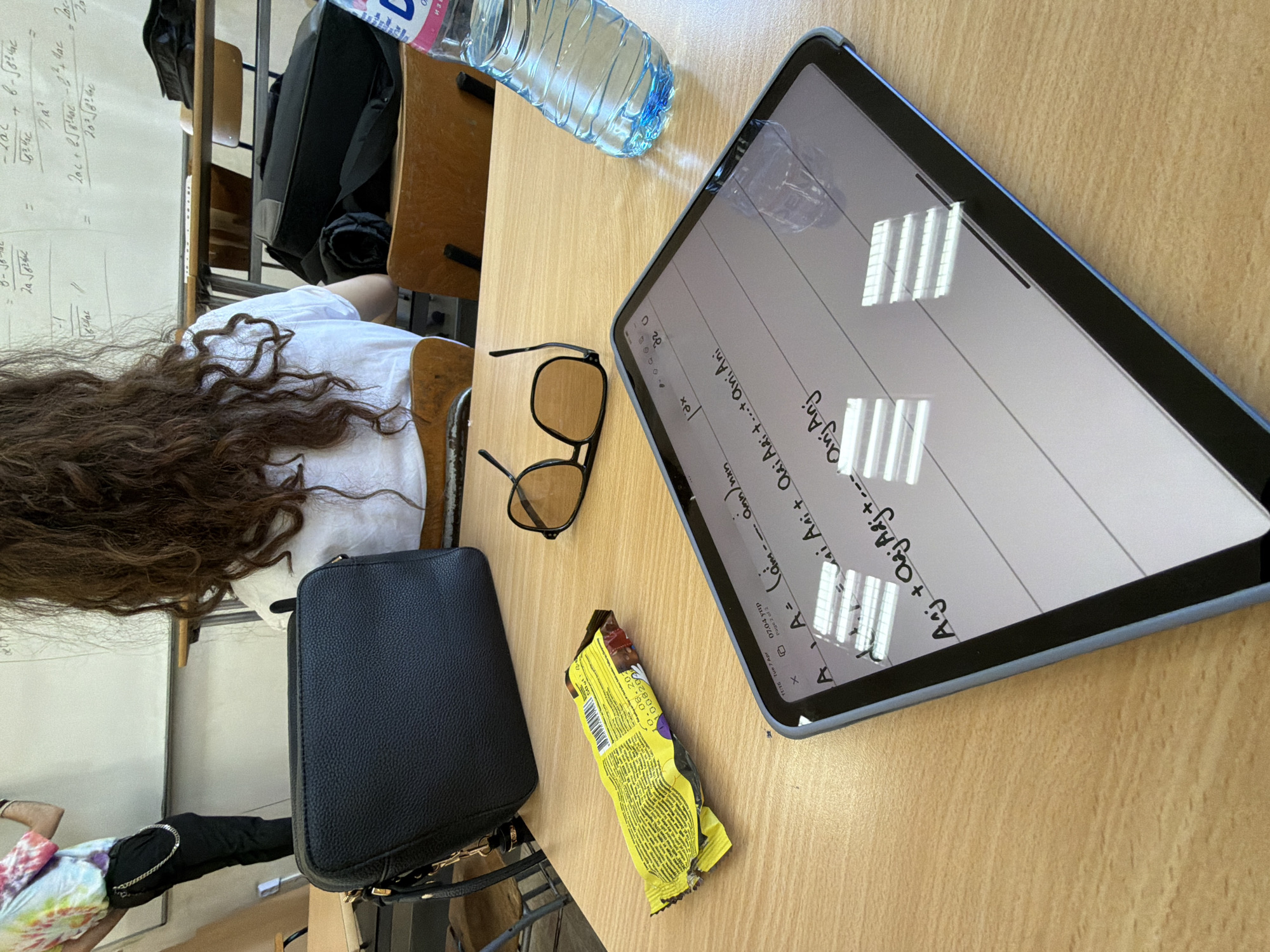 Student studies math equations on tablet in Sofia classroom