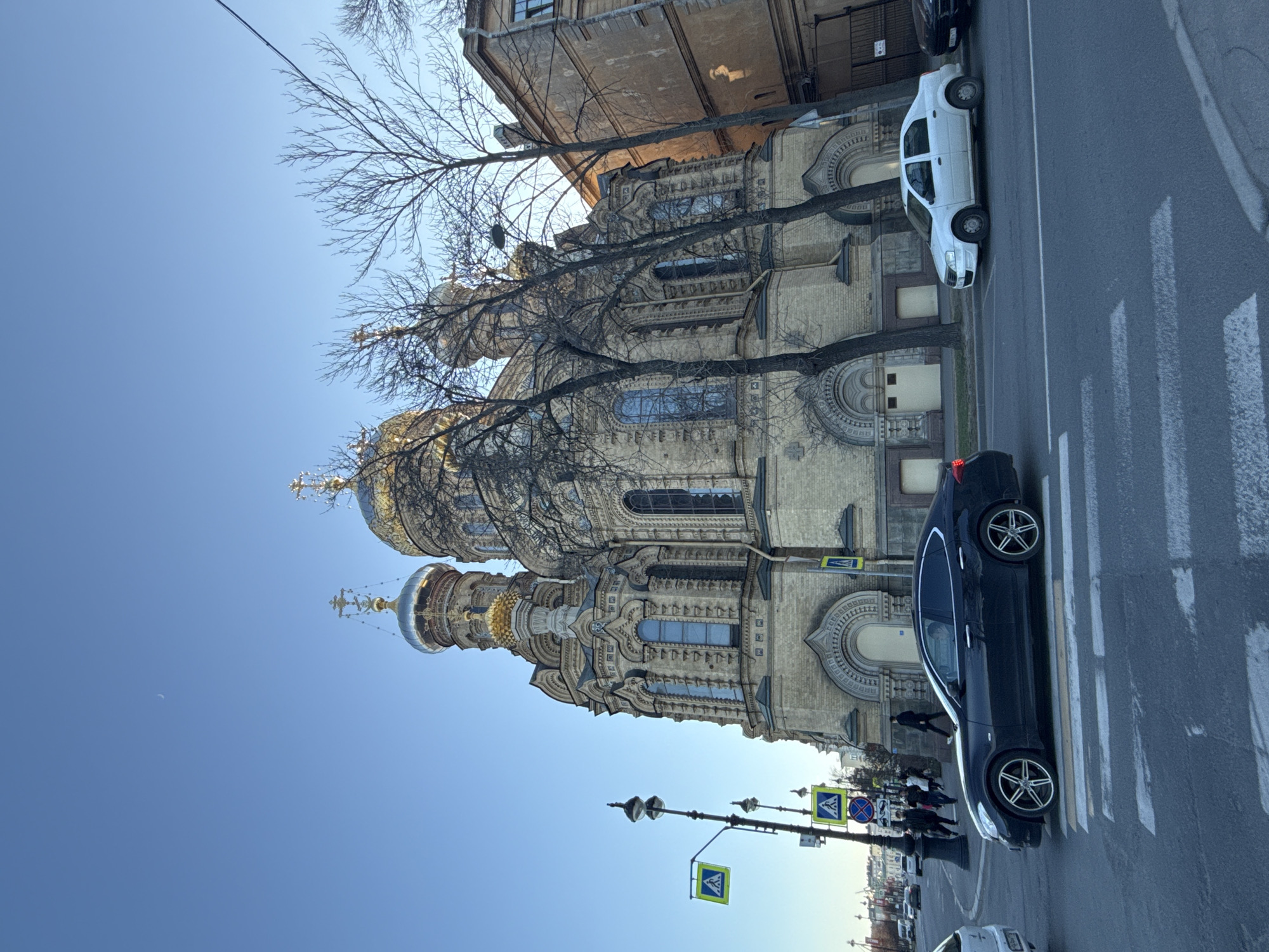 Sunny street scene with ornate church captured in Saint Petersburg