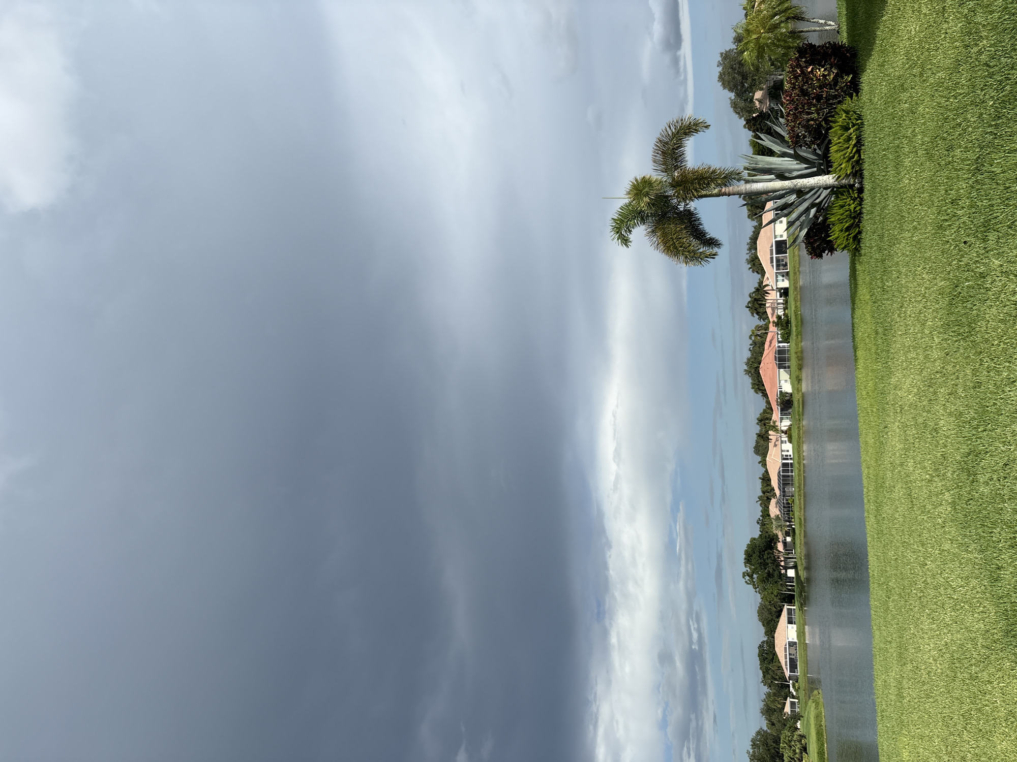 Calm lakefront view from a Sarasota residential neighborhood