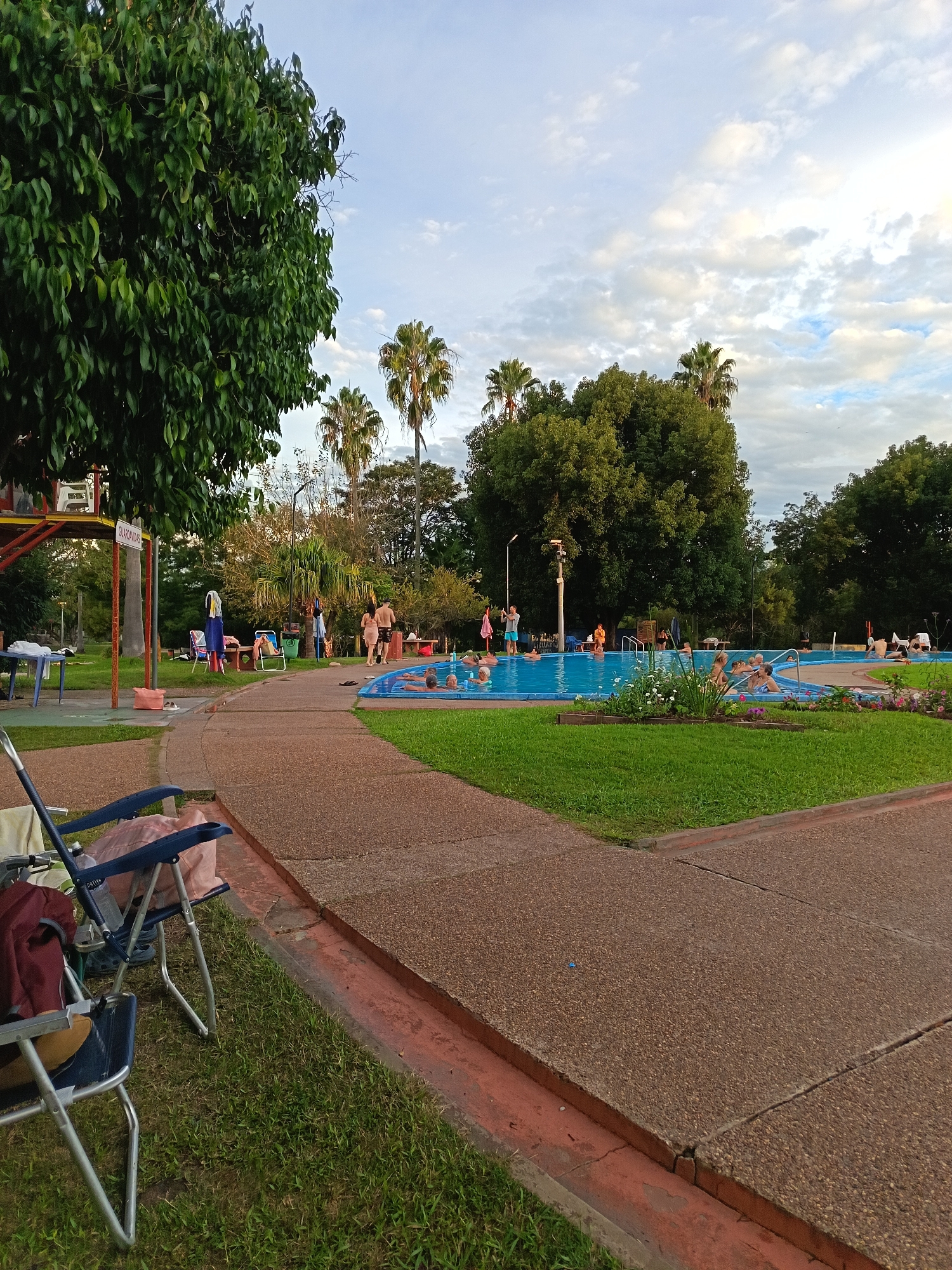 Evening crowds enjoy thermal pools at Uruguay resort