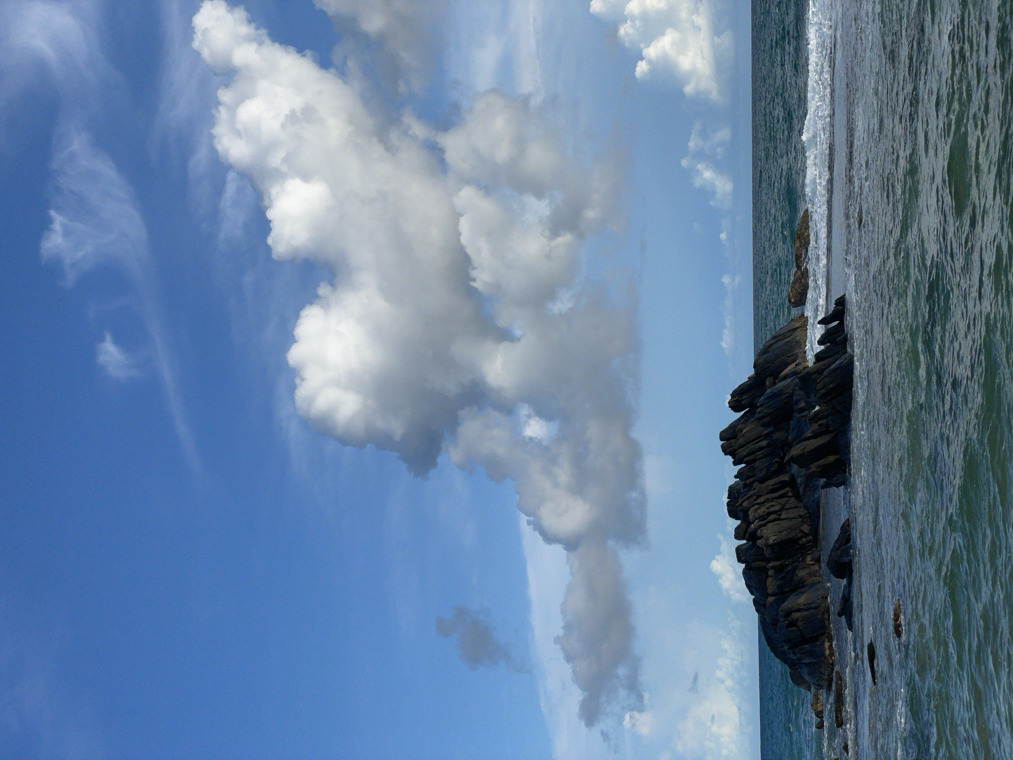 Coastal rock formation observed in clear waters off Talpe