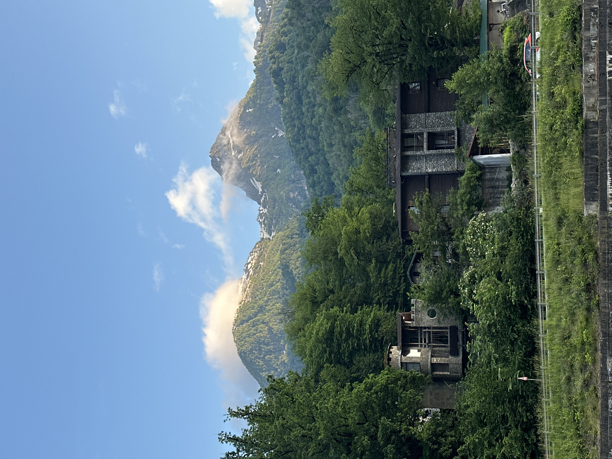 Strolling Rosa Khutor resort promenade in Russian Caucasus Mountains
