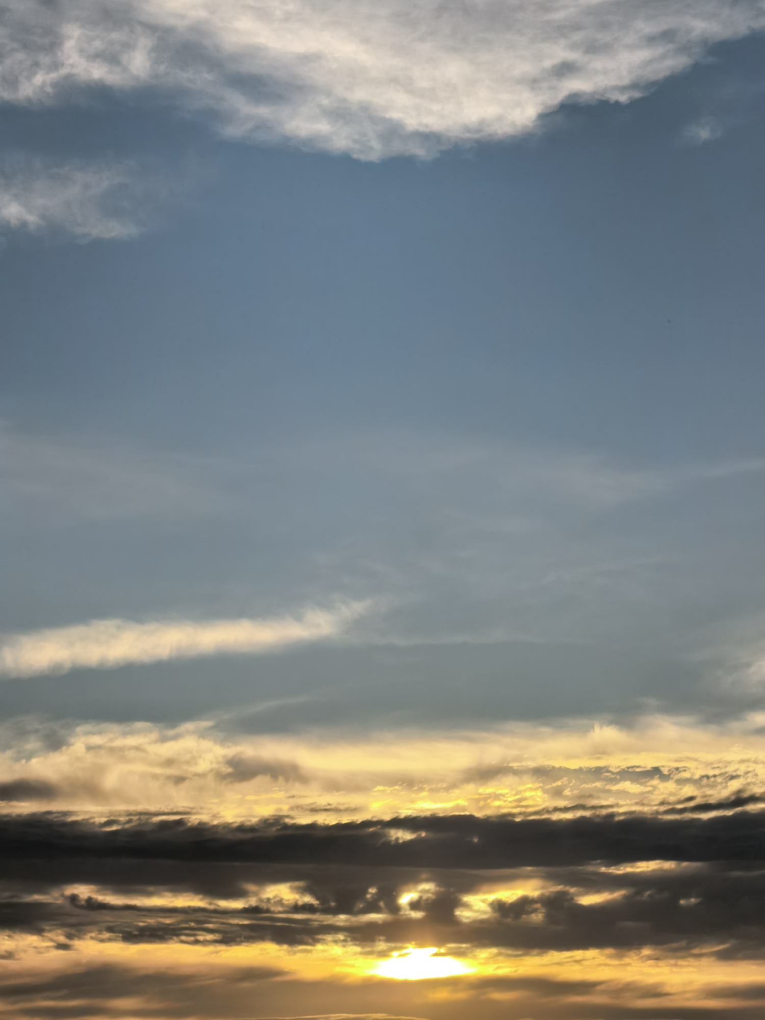 Ten angles on a layered, golden sunset sky