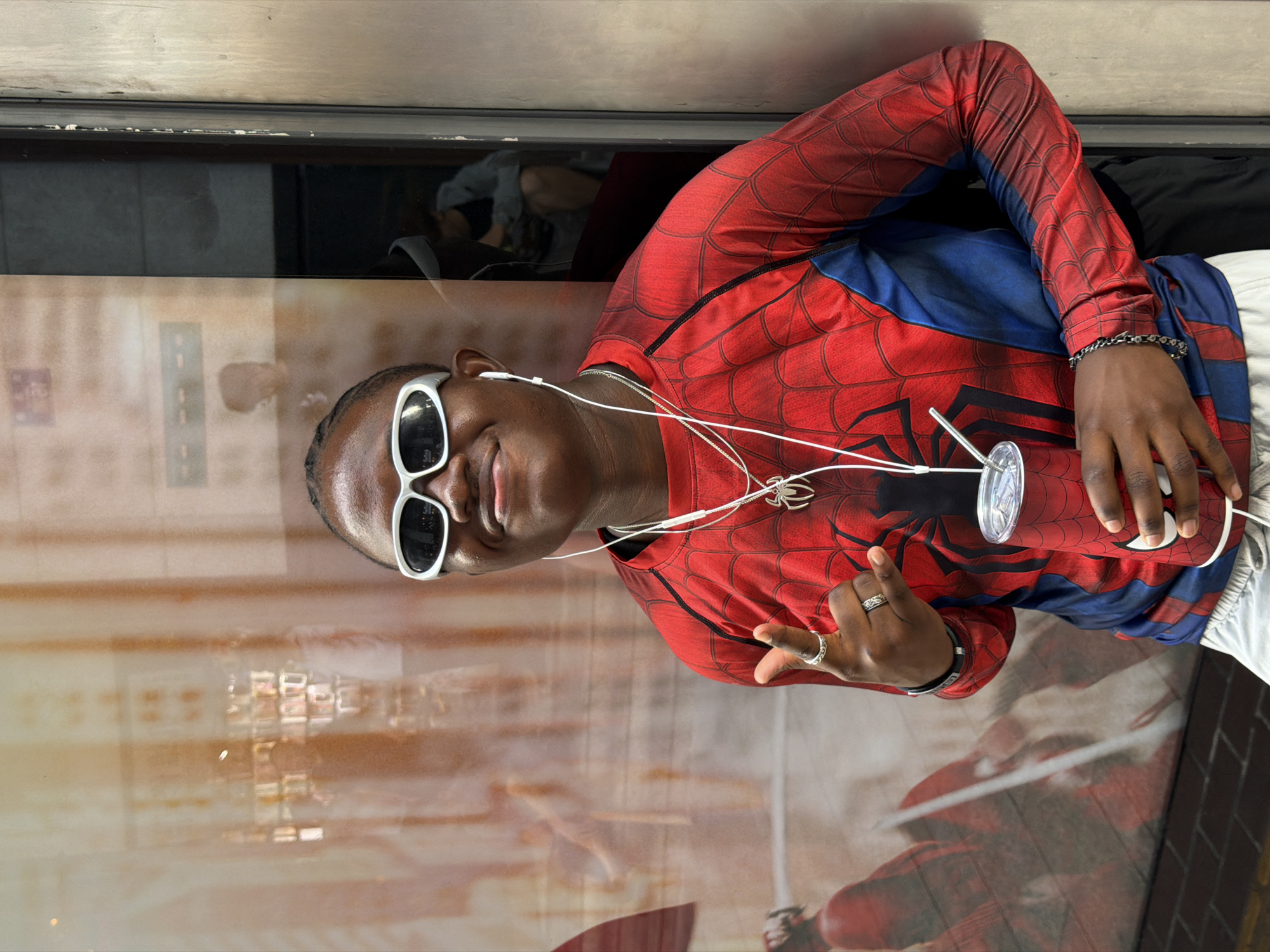 Spider-Man costume meets Spider-Man ads in Chongqing