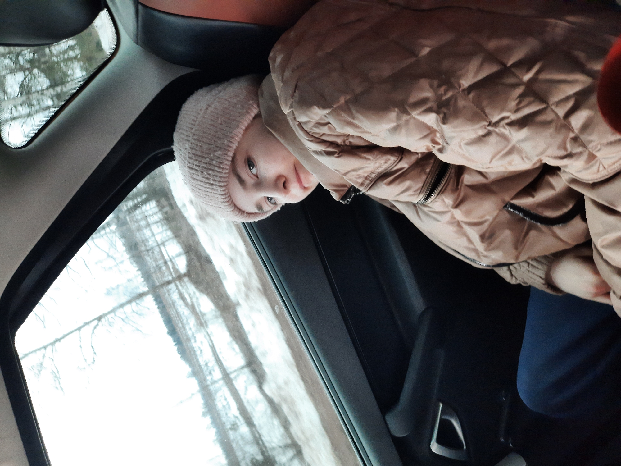 Young person in pink hat spotted in car in Russia