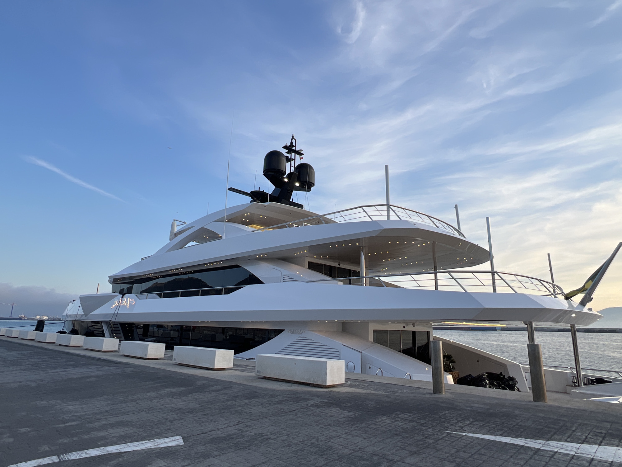 Superyacht Hagrave docked at Gibraltar harbor at sunset