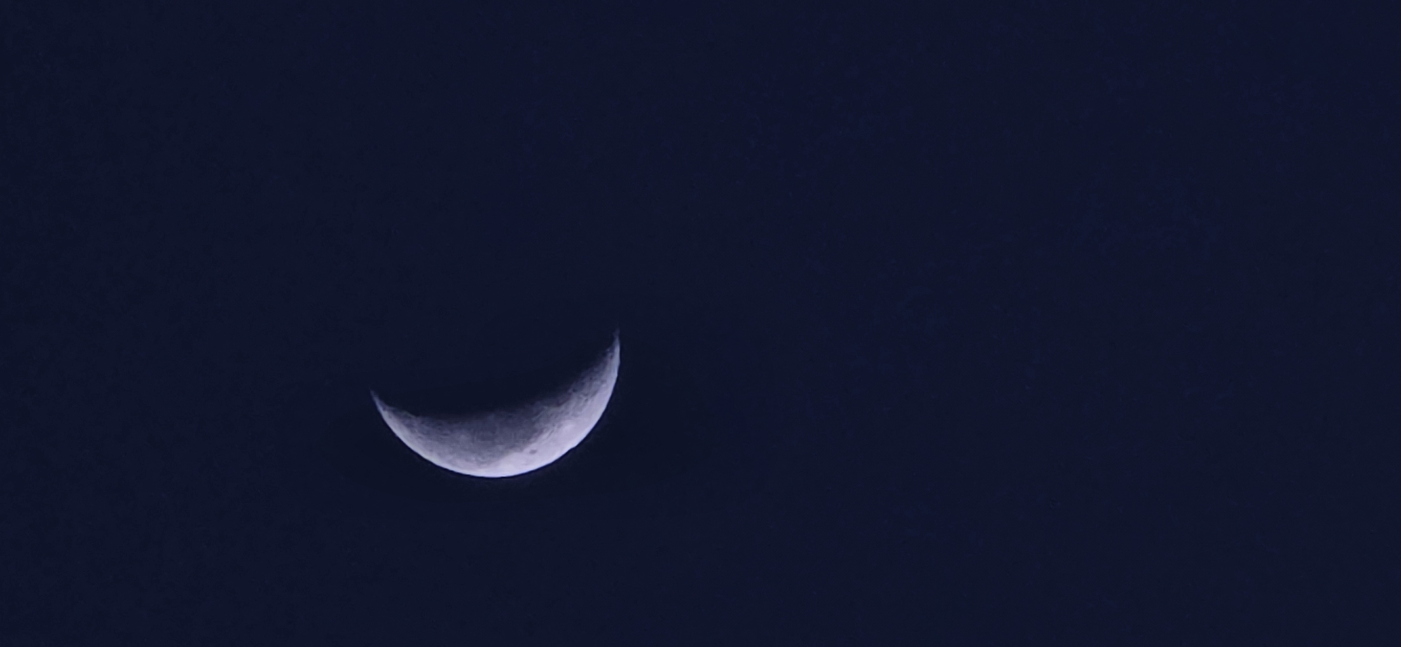 Crescent moon spotted in night sky over Smolyan, Bulgaria