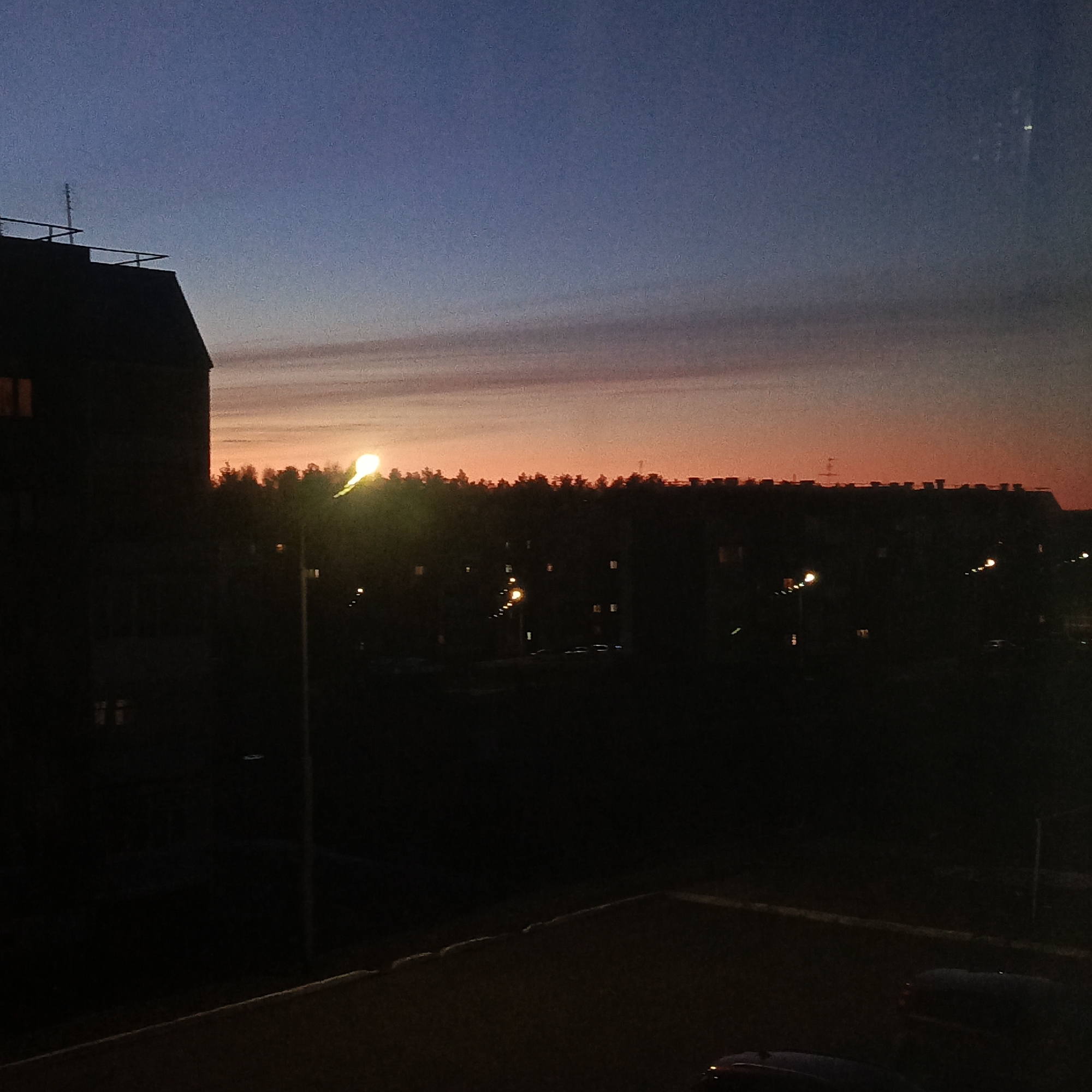 Twilight scene captured in Марковский, Russia shows colorful sky transition