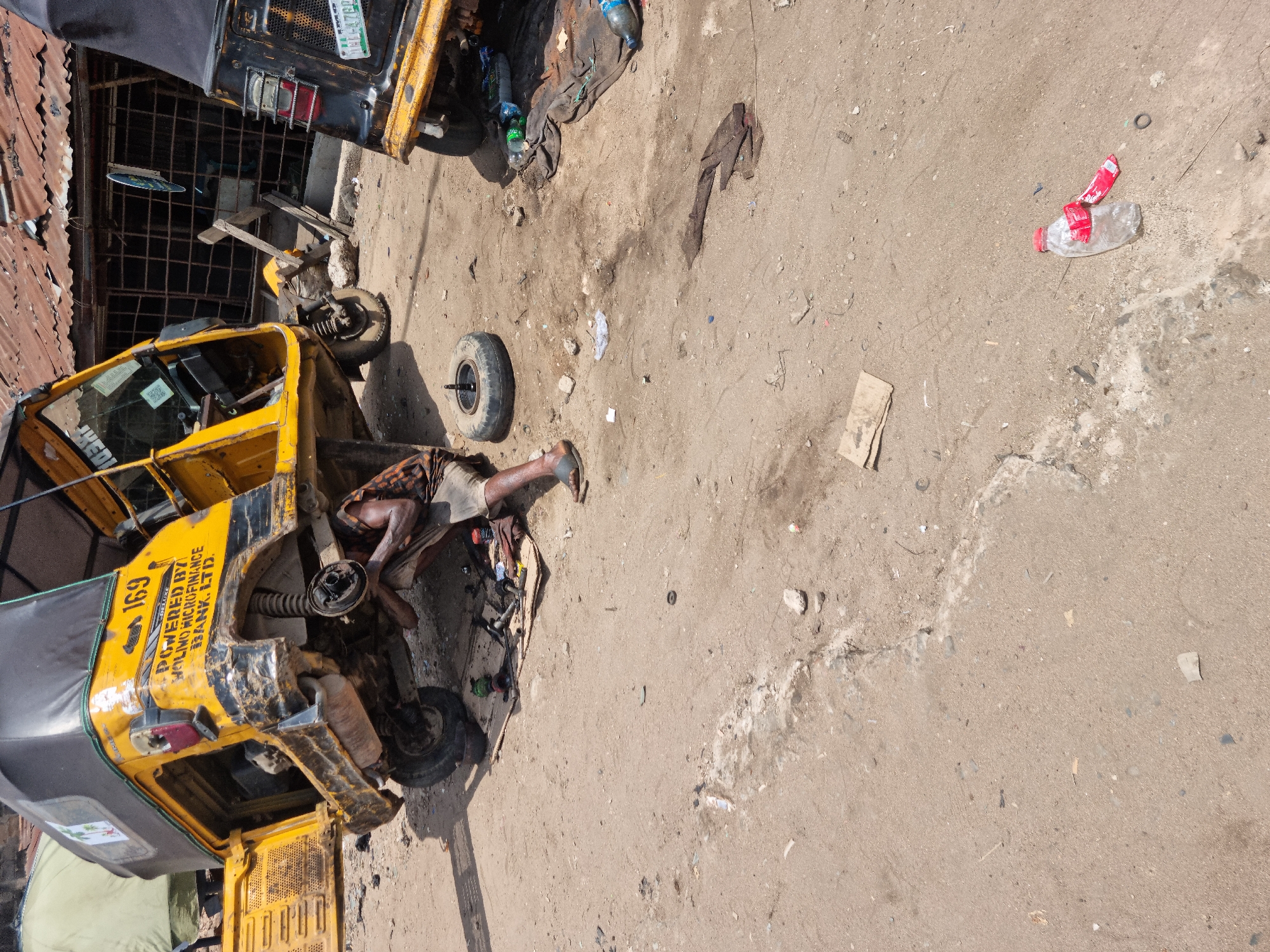 Daily life documented in Onitsha auto repair district