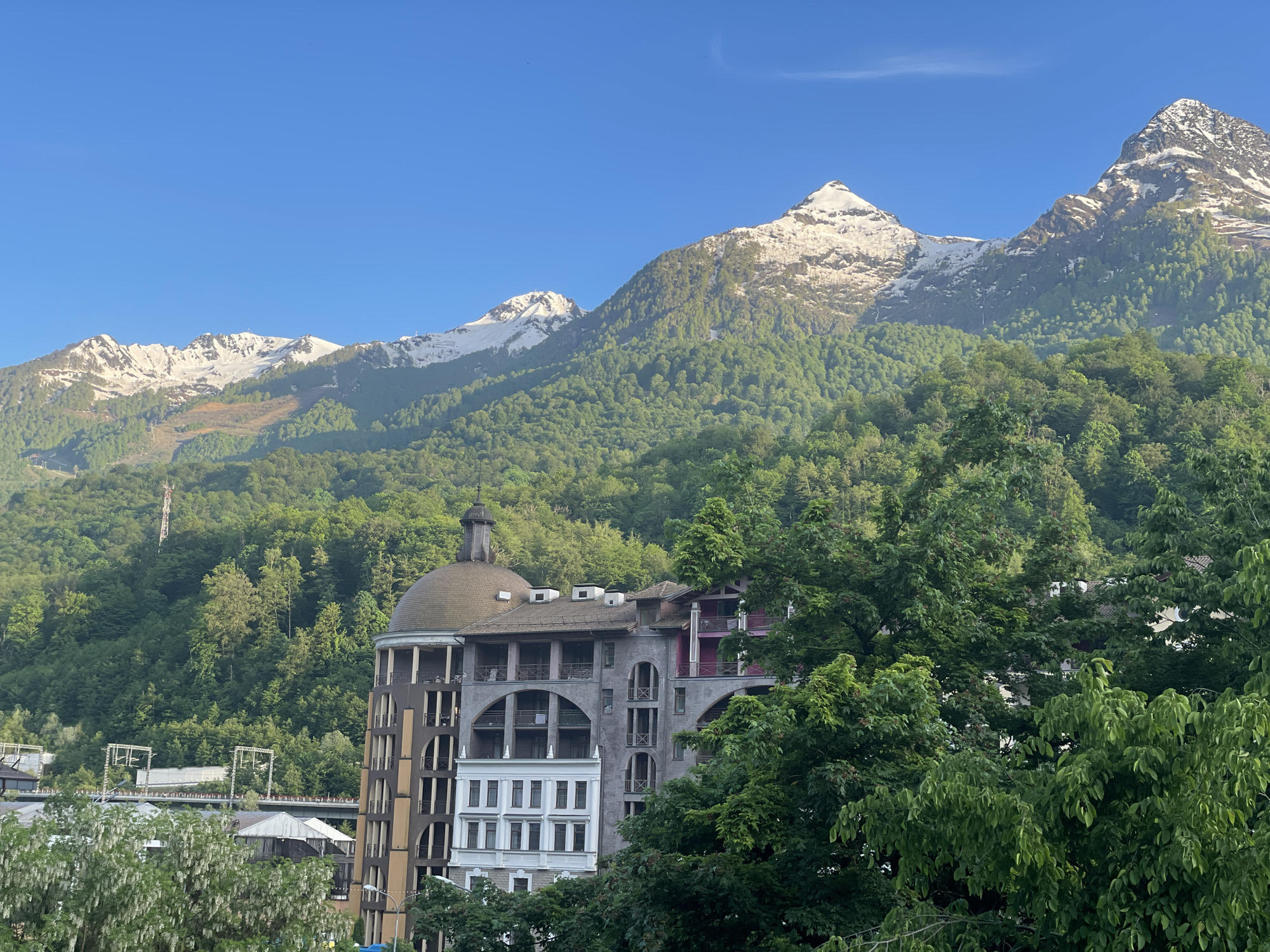Clear morning skies frame Estosadok's natural and architectural beauty