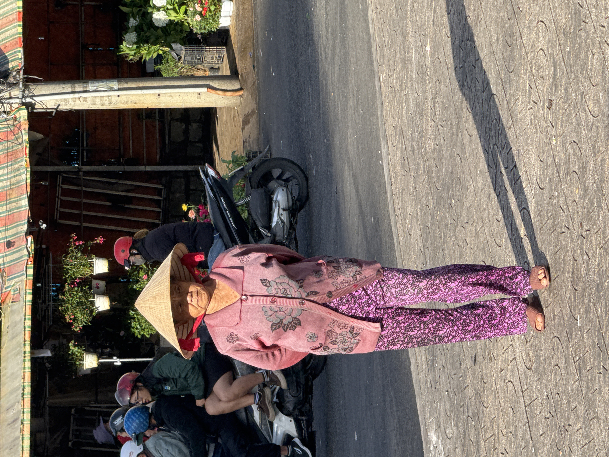 Daily street life documented in Da Lat market district