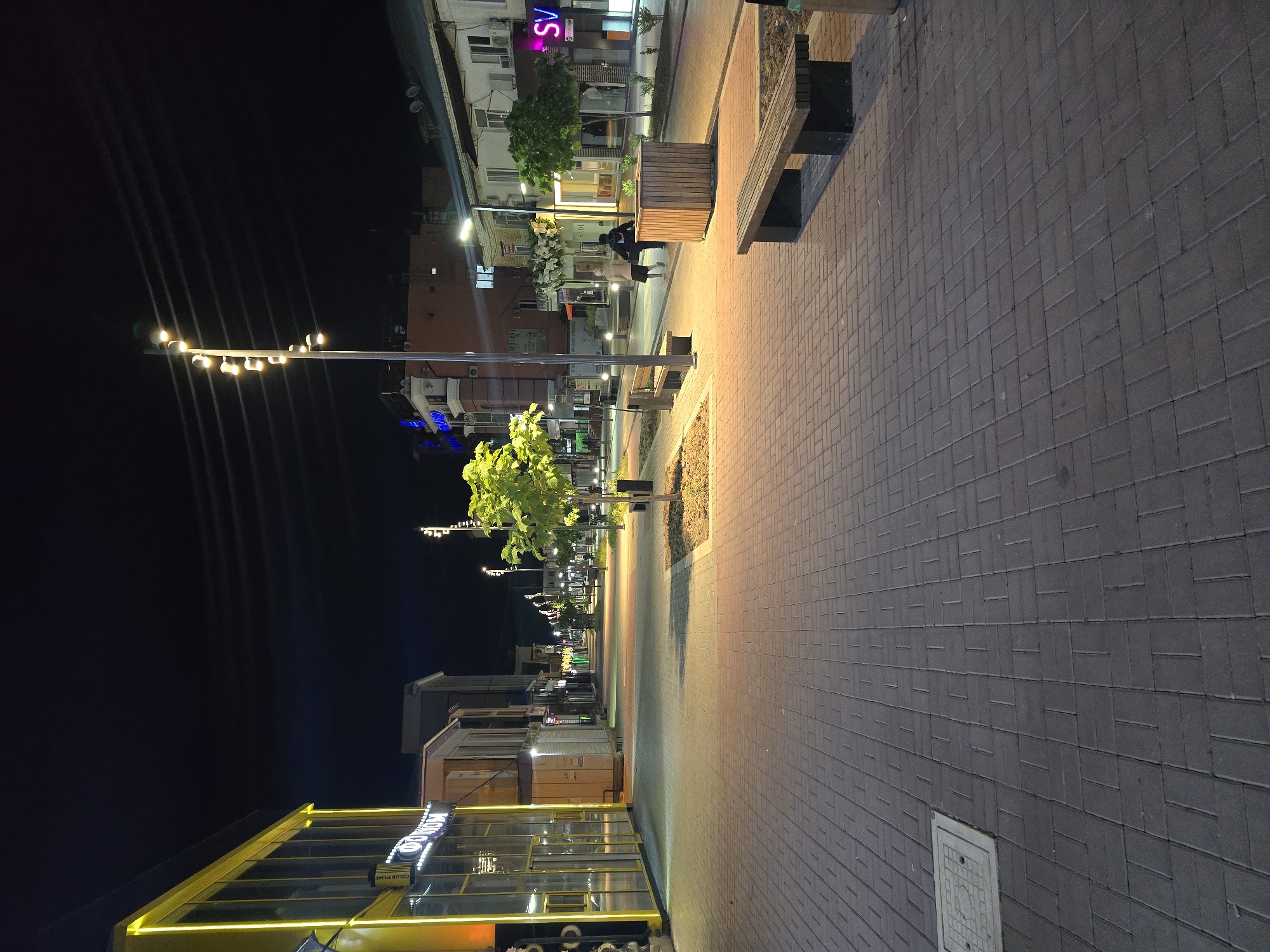 Khasavyurt's lit-up pedestrian street on a summer night