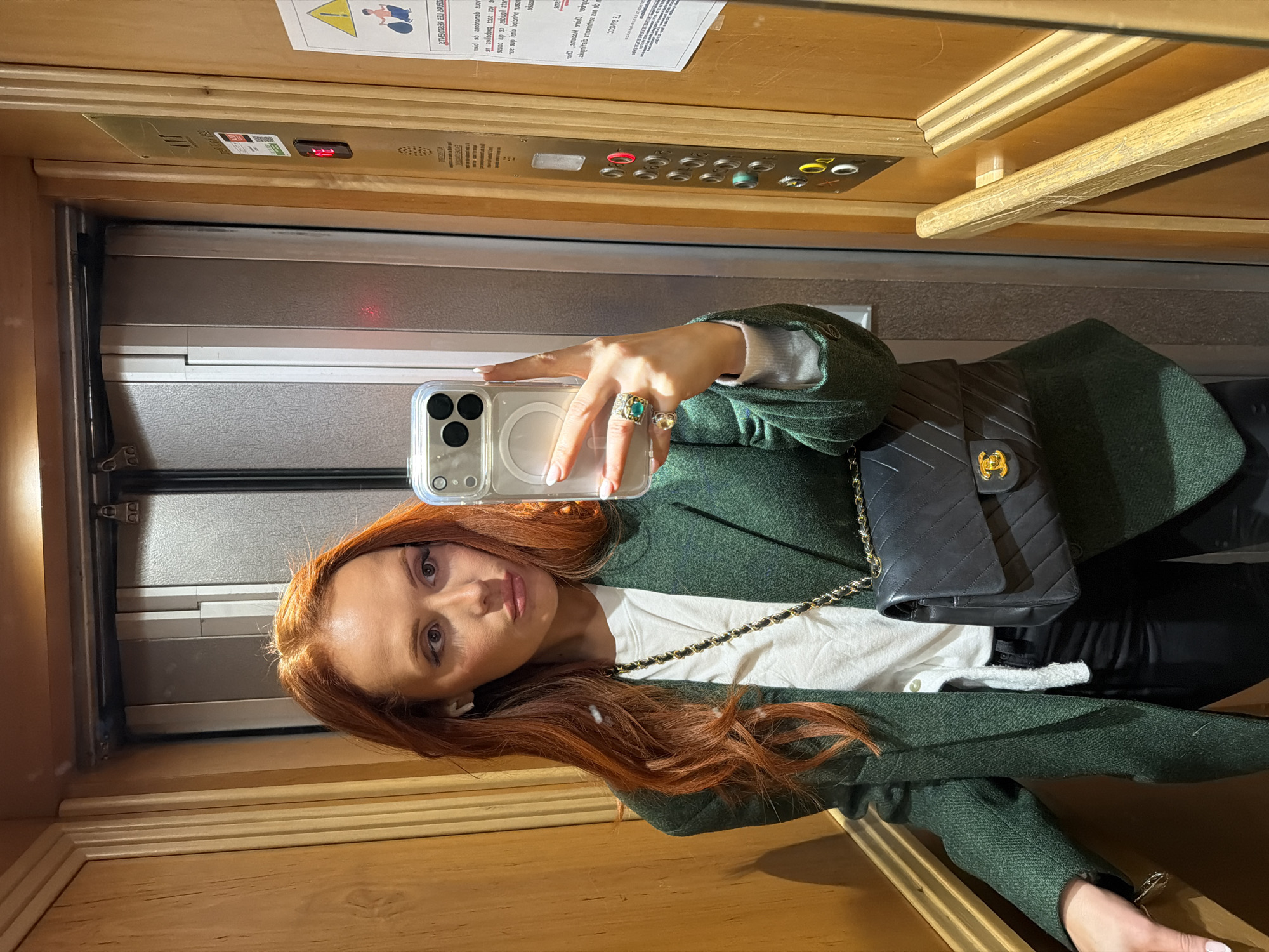 Woman Takes Elevator Selfie in Paris
