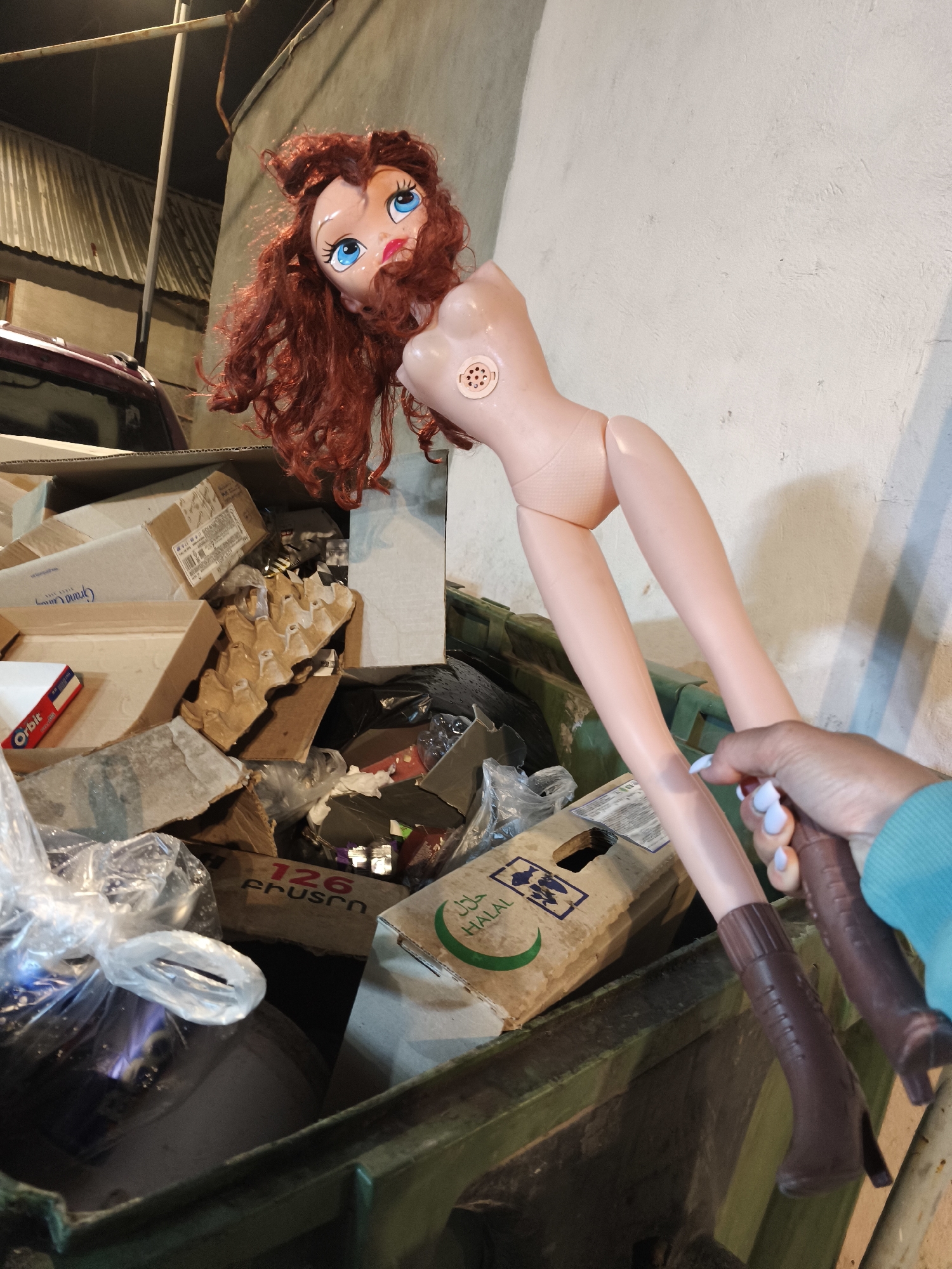 Dismembered doll with cowboy boots found in Yerevan dumpster