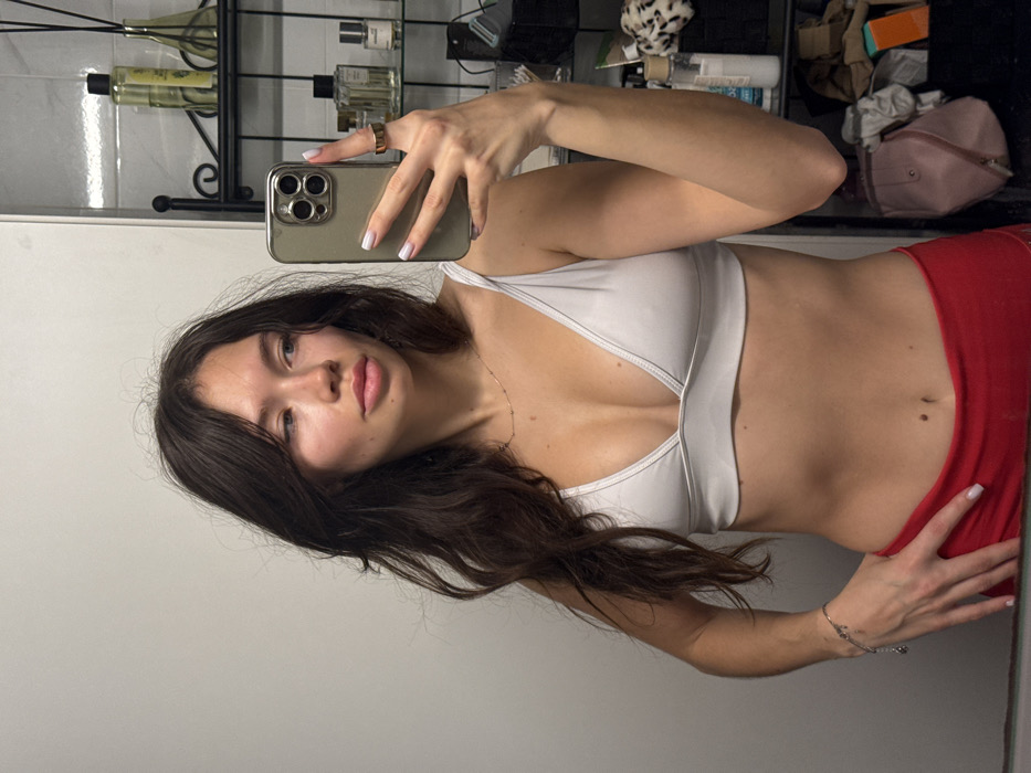 Woman takes morning selfies in Tel Aviv bathroom