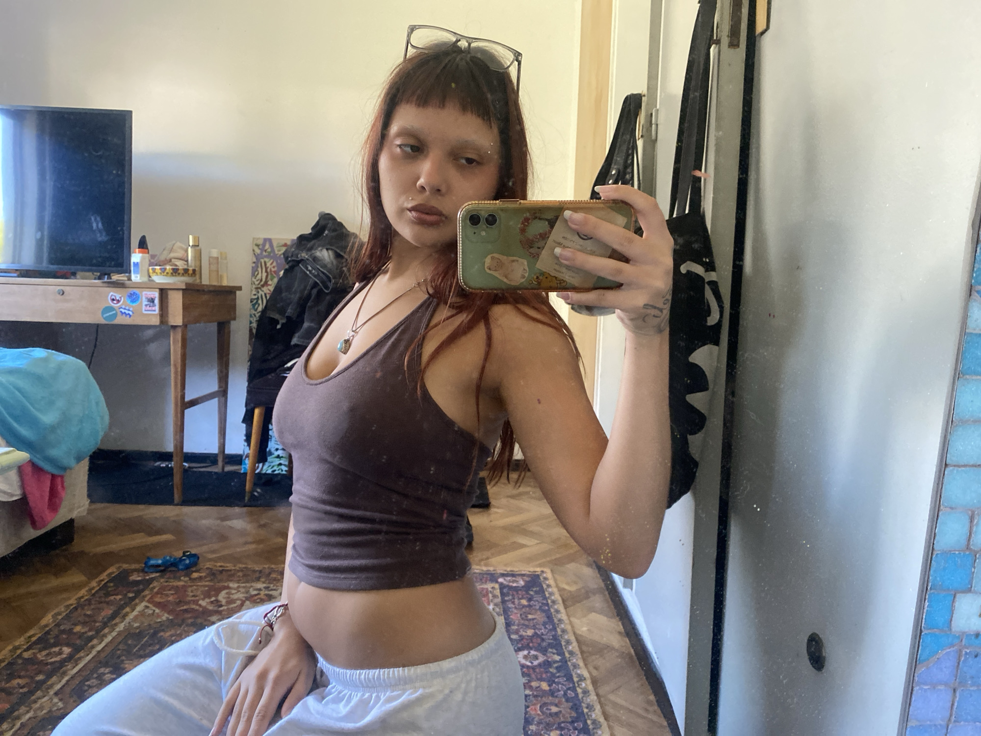 Mirror selfies captured in Buenos Aires indoor setting