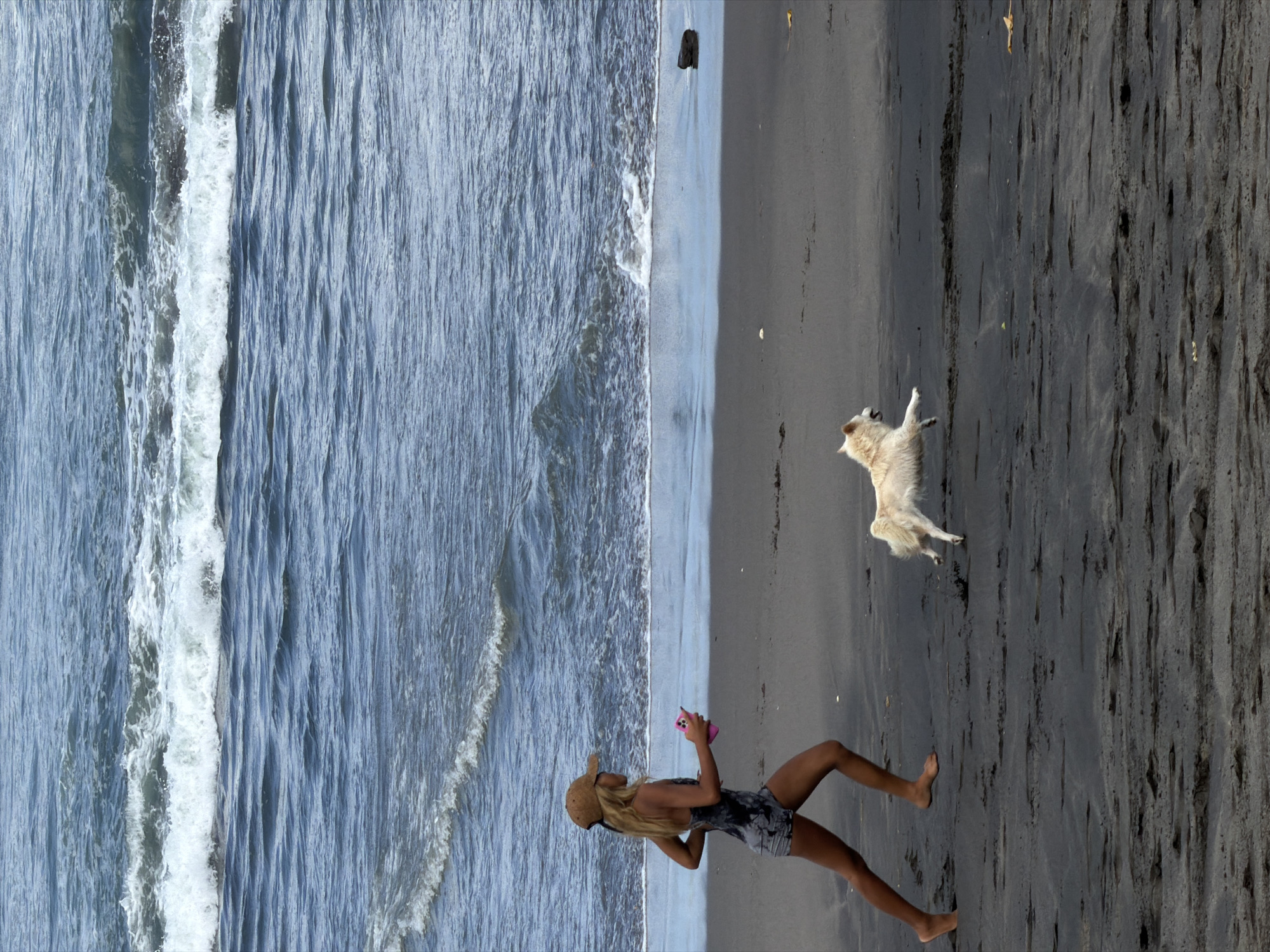 Beach, statues, and everyday life along Bali's Mengwi coast