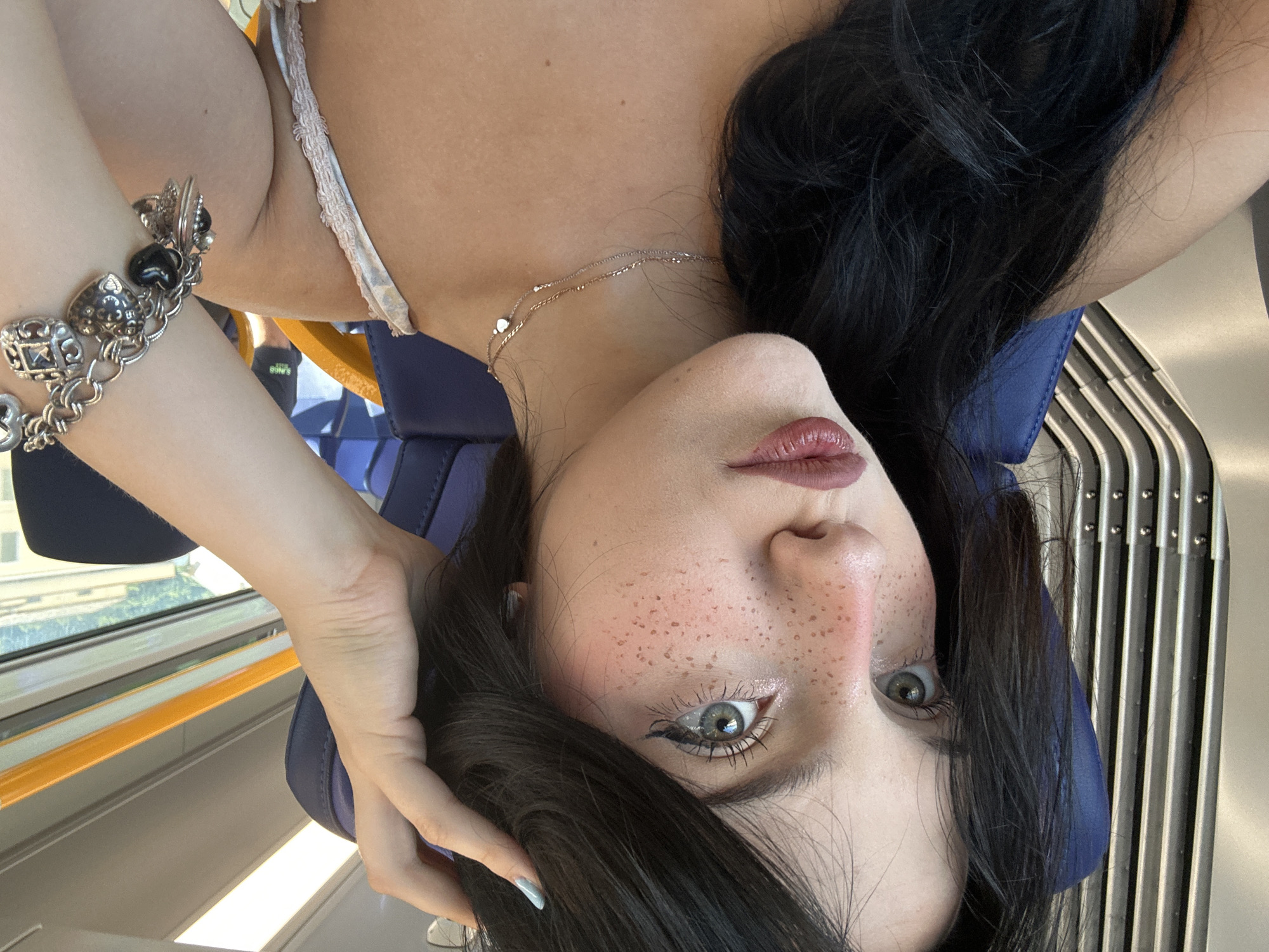 Selfie moment aboard a train rolling through coastal Italy