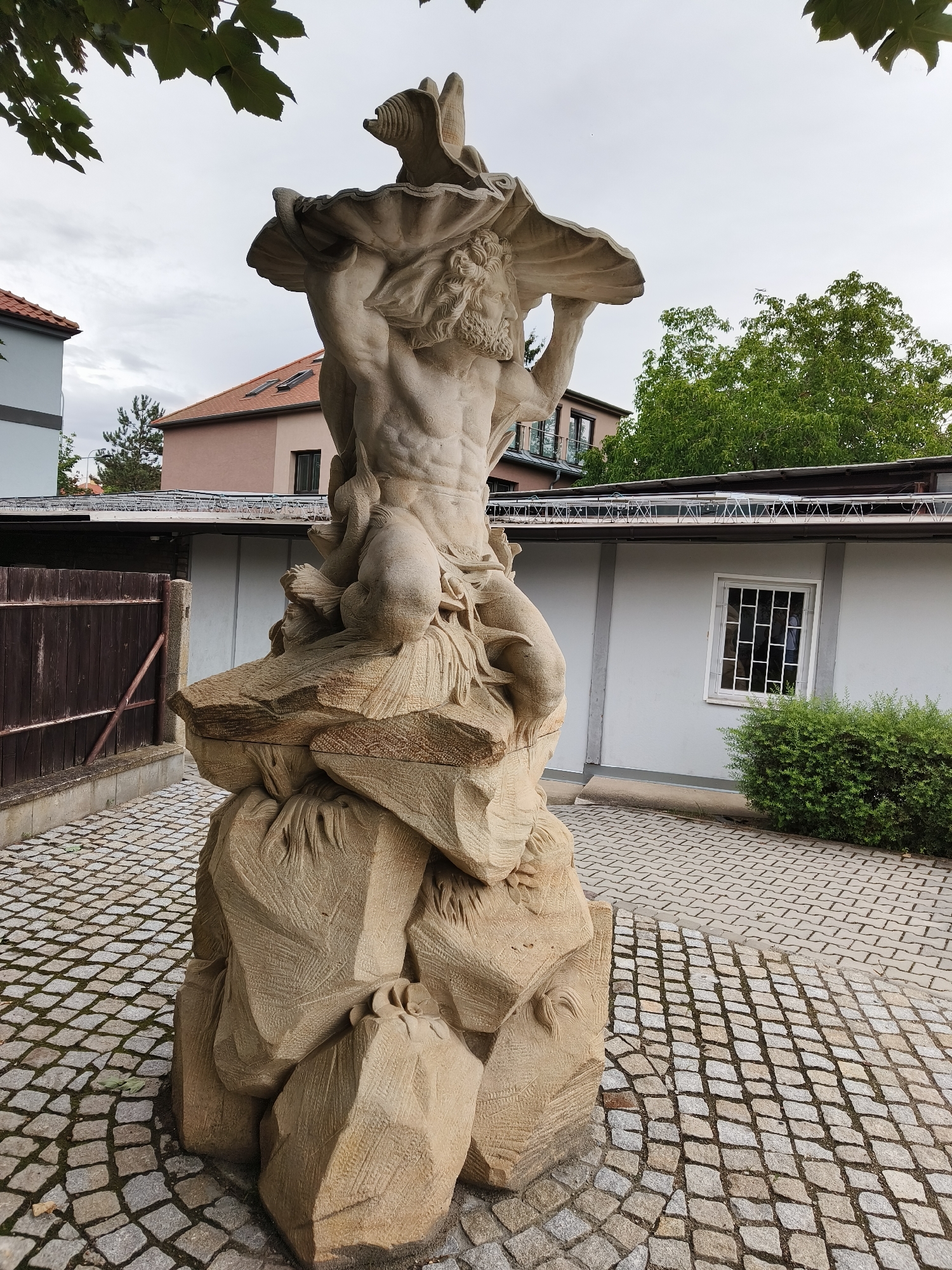 Ornate stonework and vintage furniture details in Prague