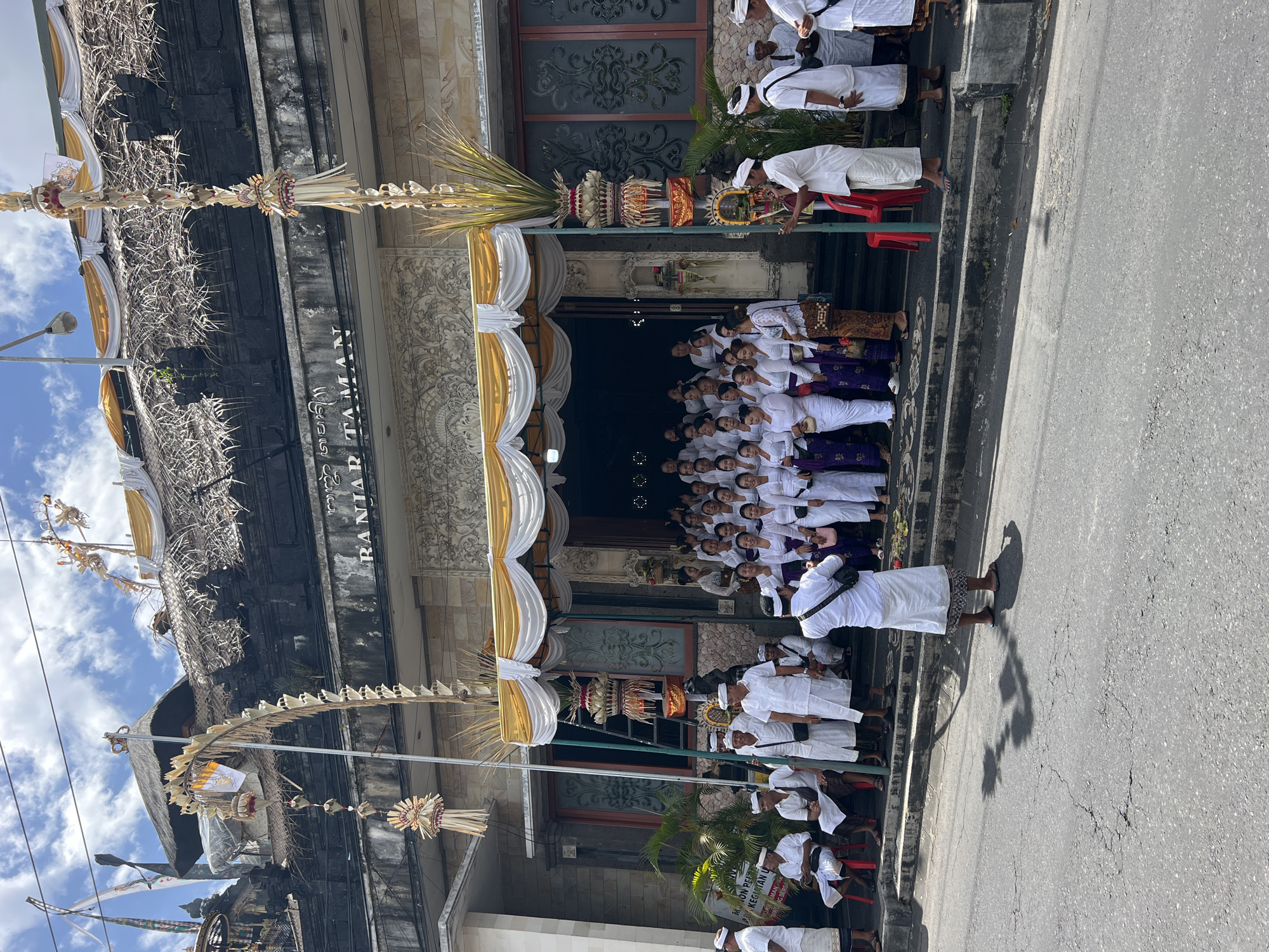 Community gathering at traditional Balinese hall in North Kuta