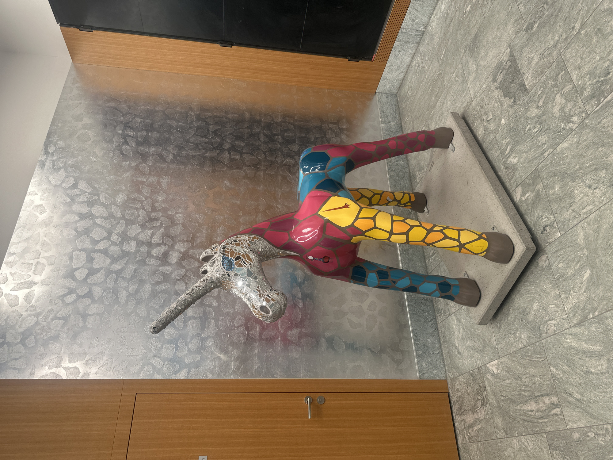 Mosaic unicorn sculpture spotted indoors in Dübendorf, Switzerland