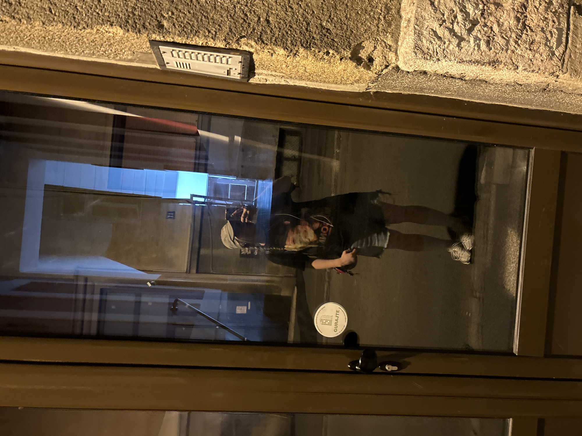 Belgrade streets at night: graffiti, a dog, and a selfie