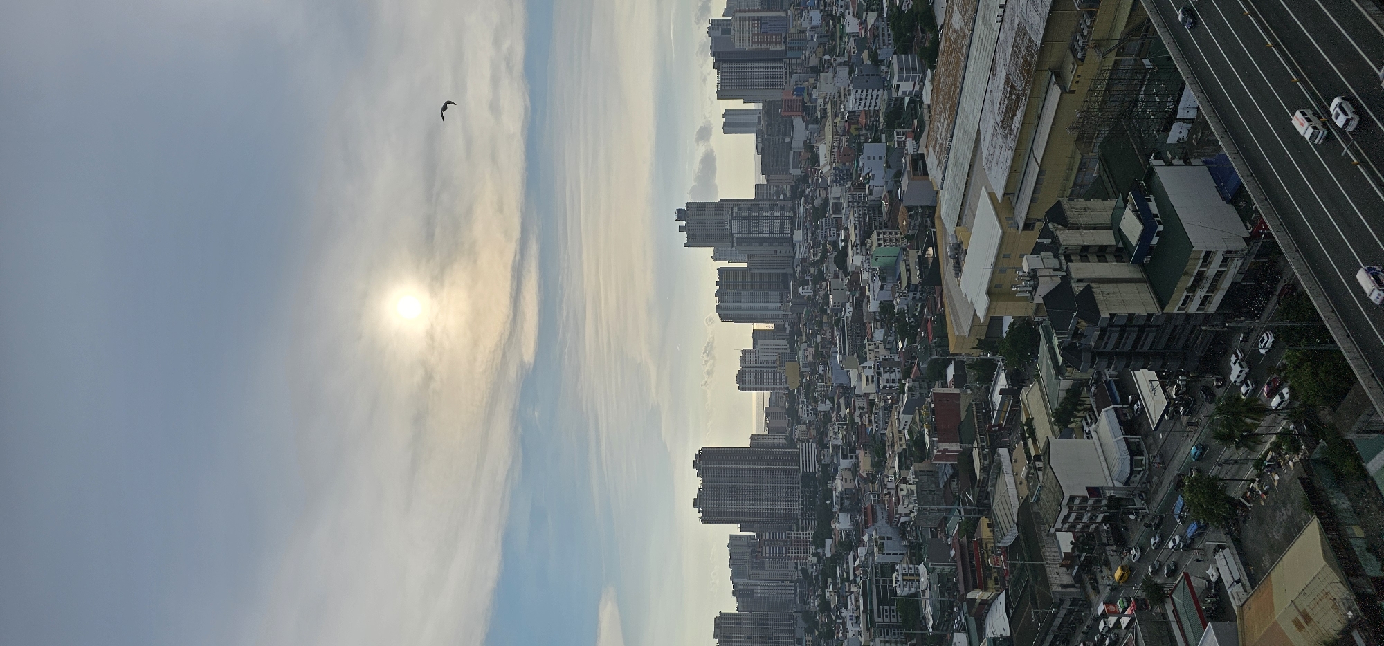 Makati skyline and elevated highway under morning overcast skies