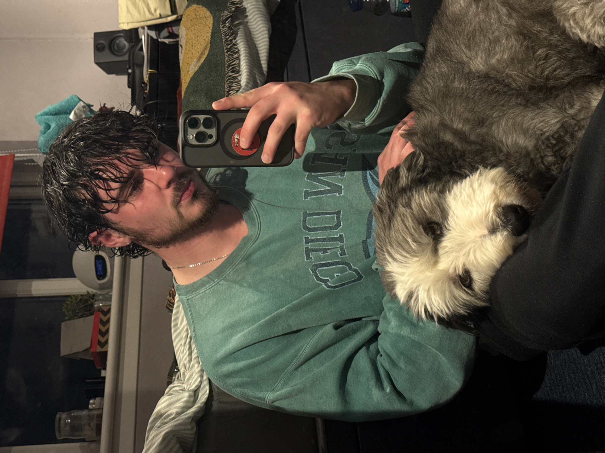 Man takes selfies with dog and in mirror