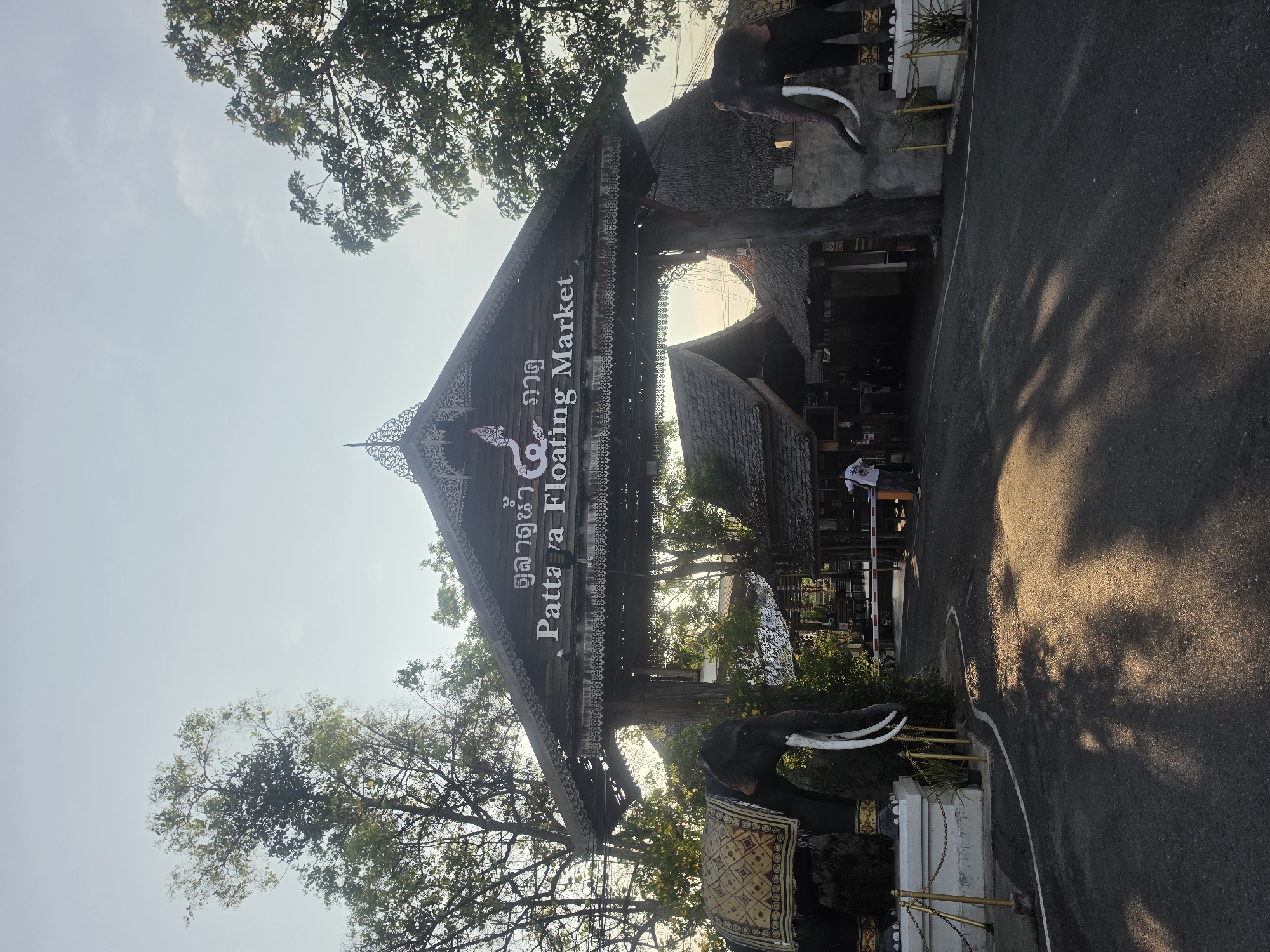 Tourist documents Pattaya Floating Market entrance and decorative features