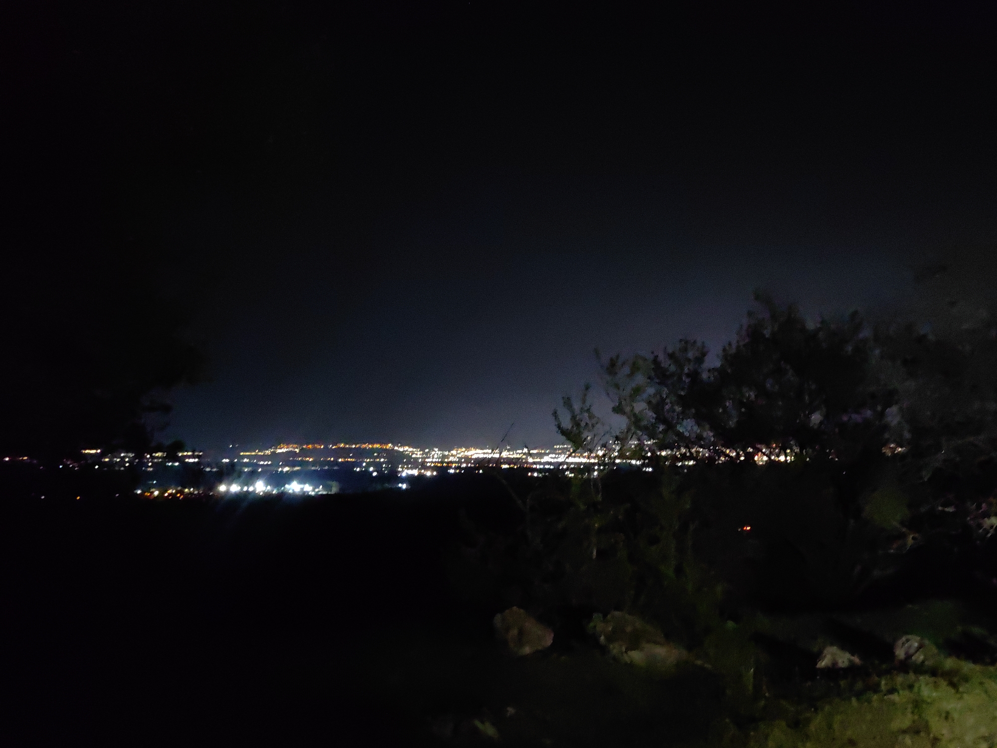 Night drive through Sofia captures city lights and forest roads