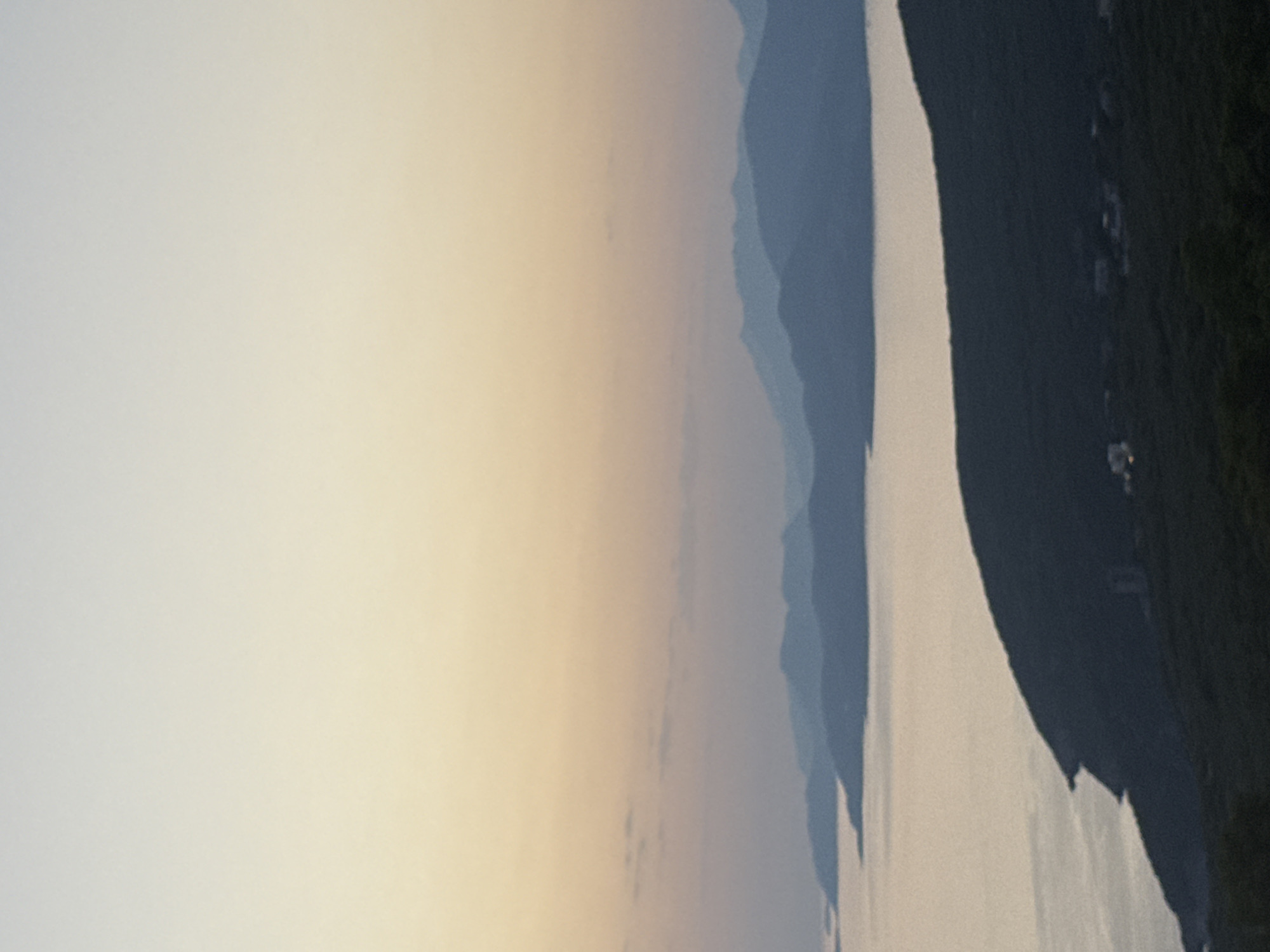 Dusk over Kovačko Polje — church, coastline, spider webs, and crescent moon