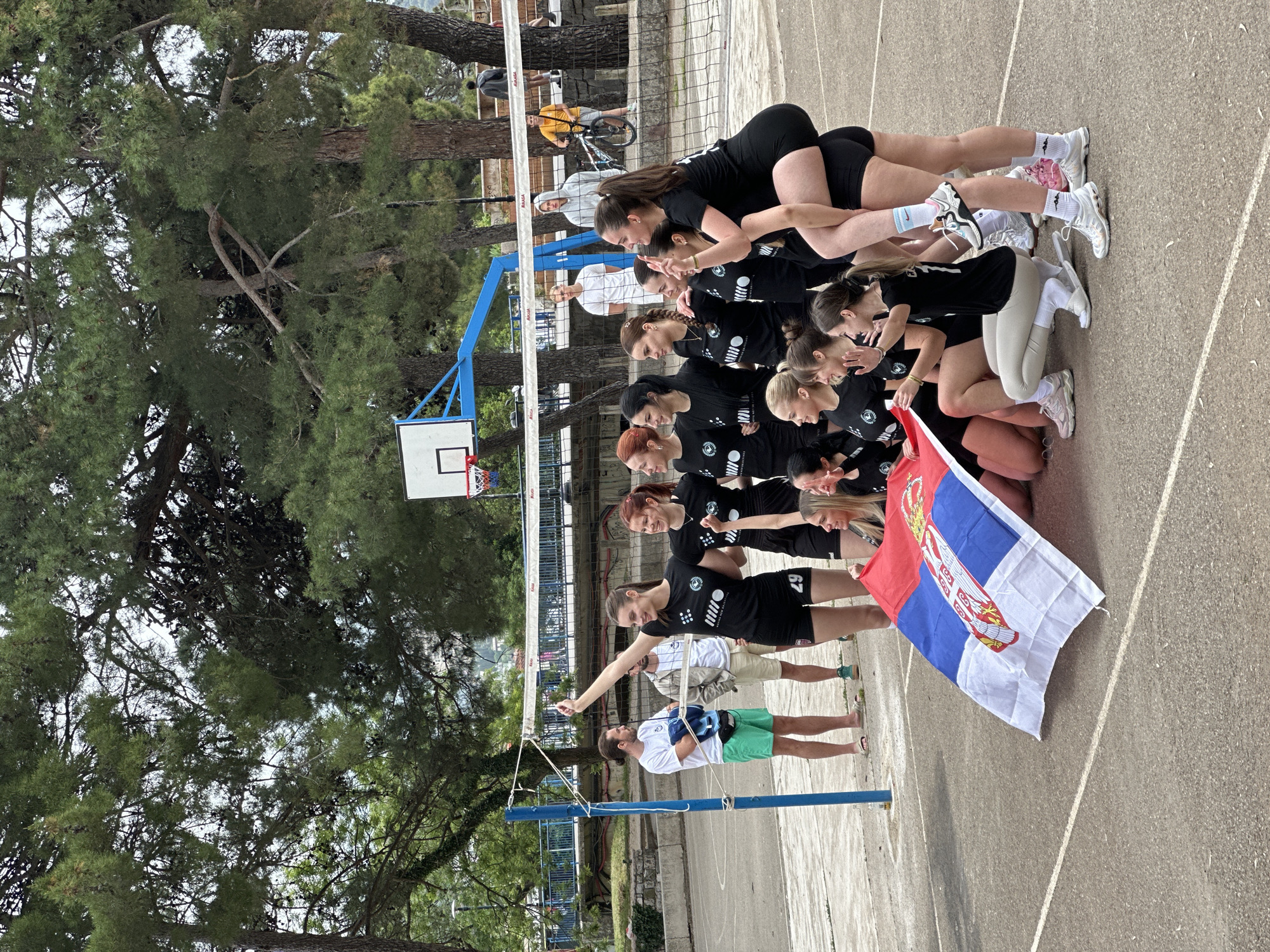 Women's volleyball team practices and celebrates in Budva