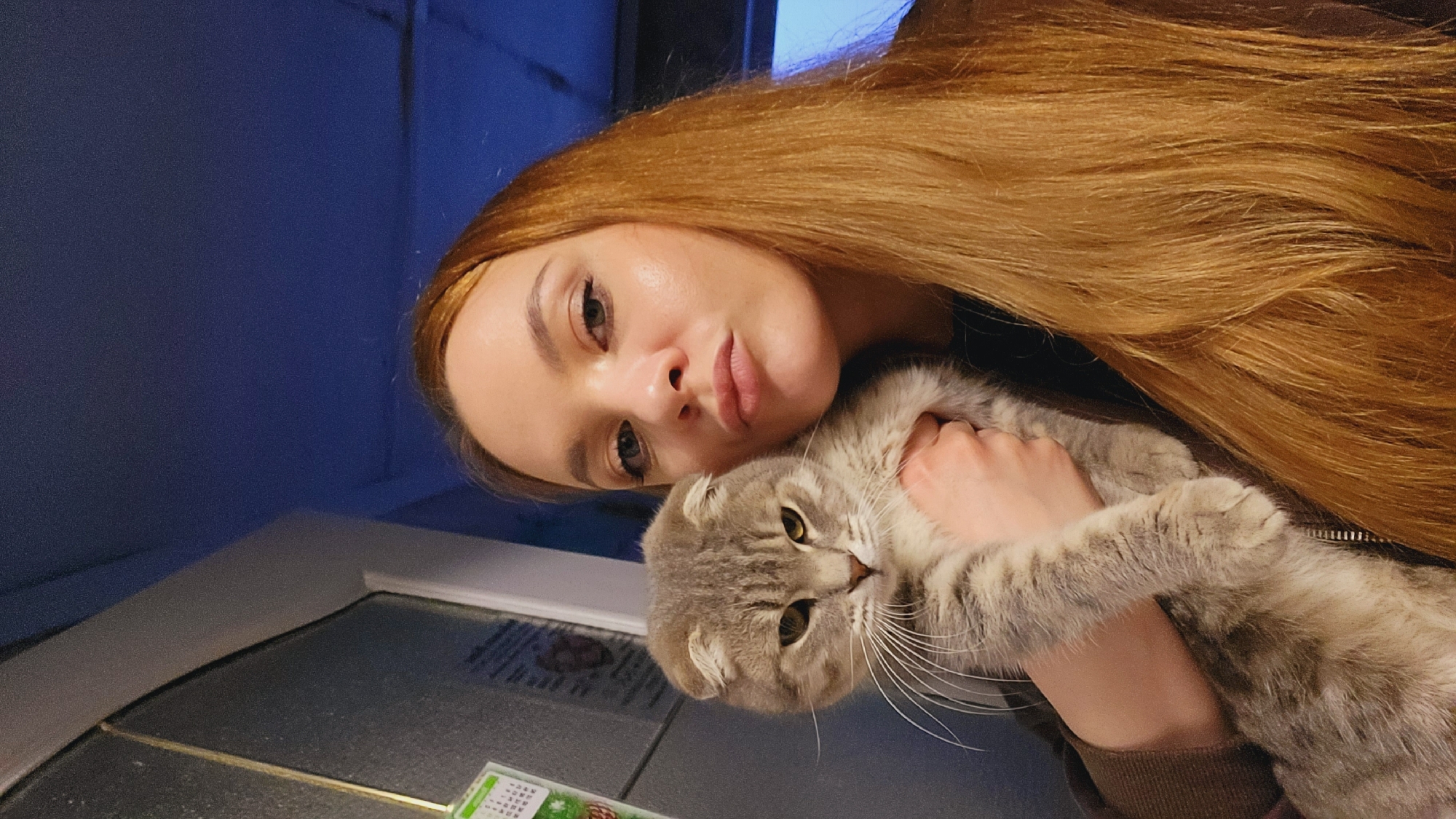 Woman takes selfies indoors in Зипуново, Russia