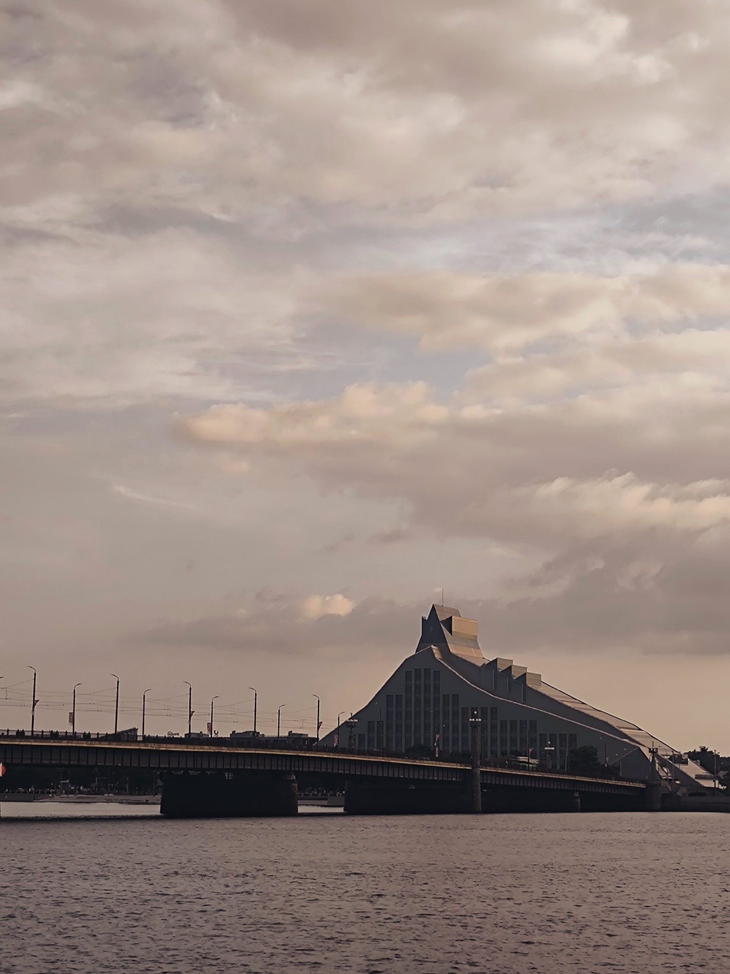 Riga's Daugava riverfront skyline at golden hour