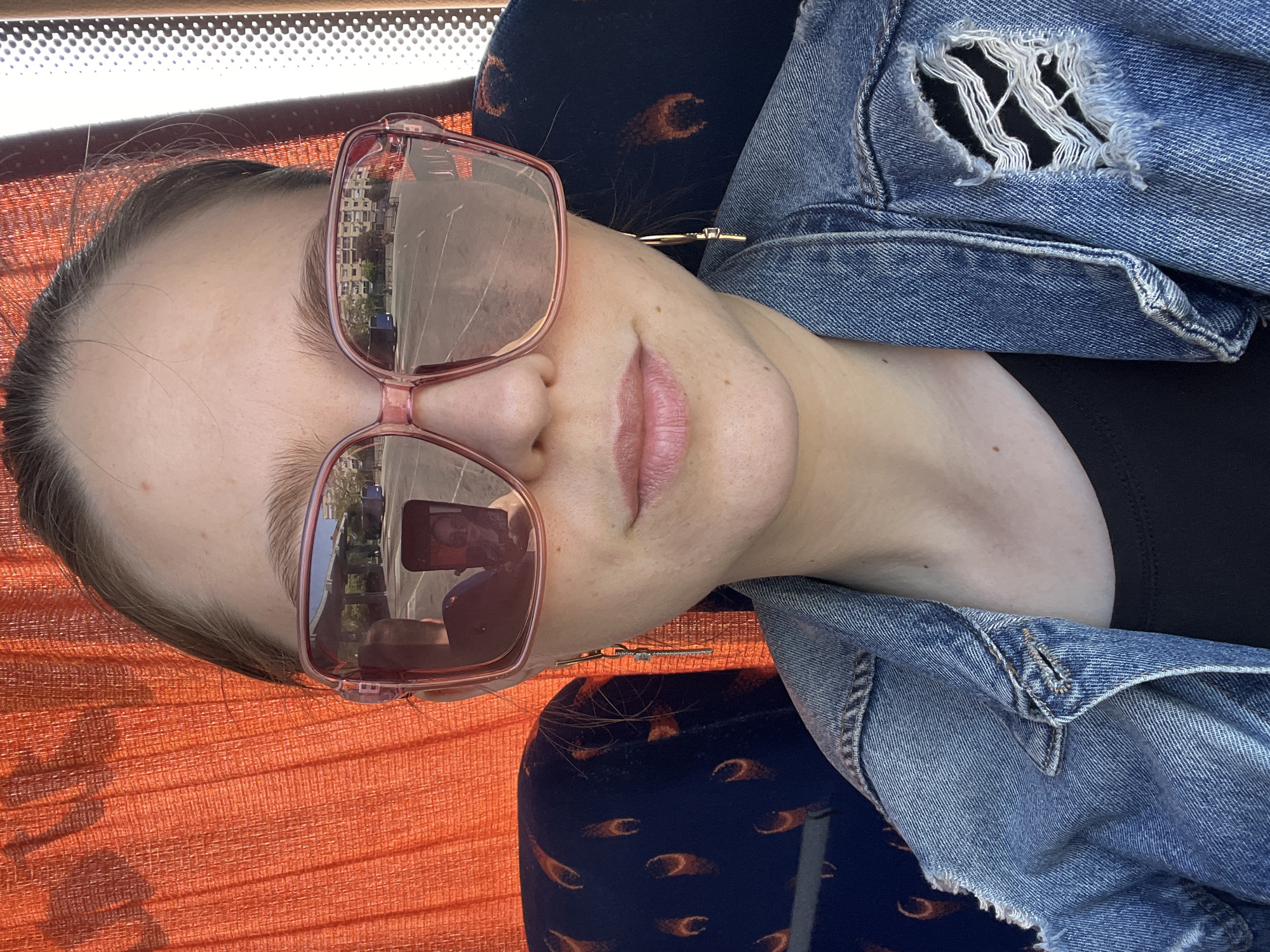 Bus passenger takes selfie aboard public transport in Podgorica