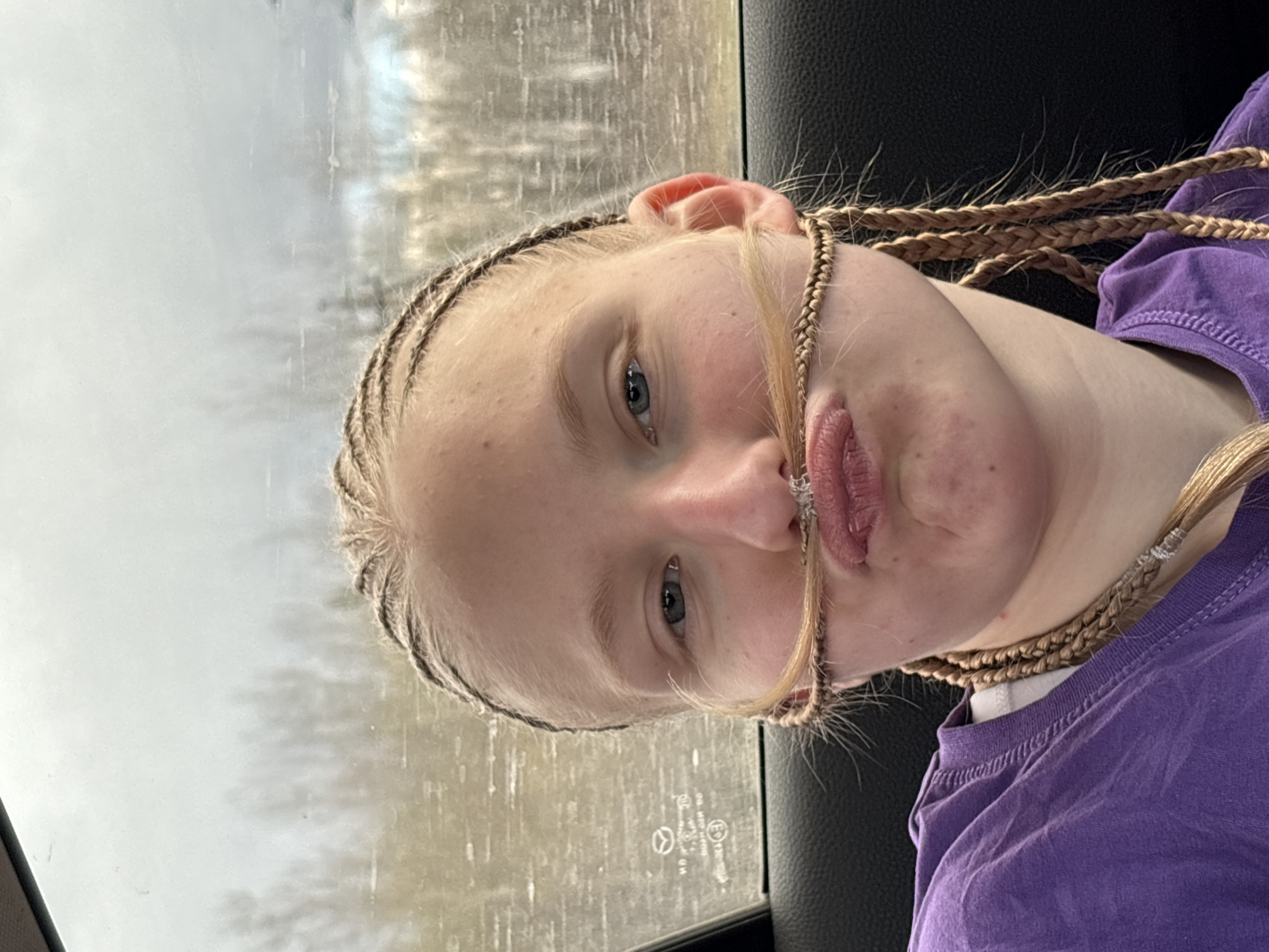 Young person photographed in car in Malaya Purga, Russia