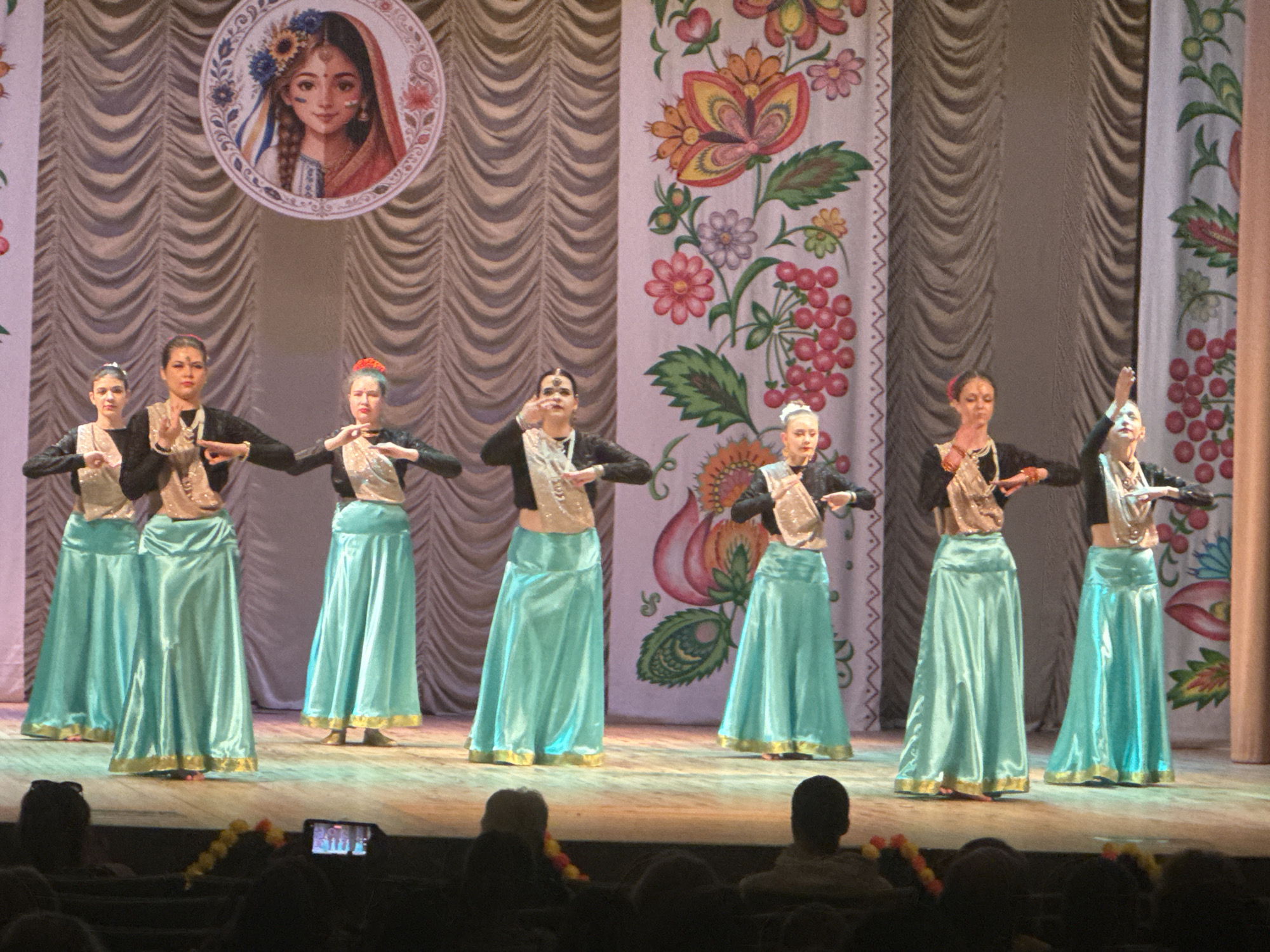 Traditional Indian-Ukrainian cultural dance performance held in ornate theater