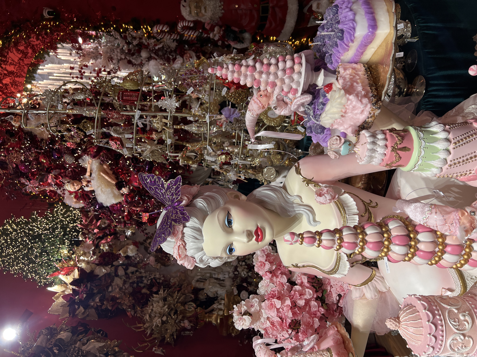 Marie Antoinette mannequin displayed among sweets in Budapest shop