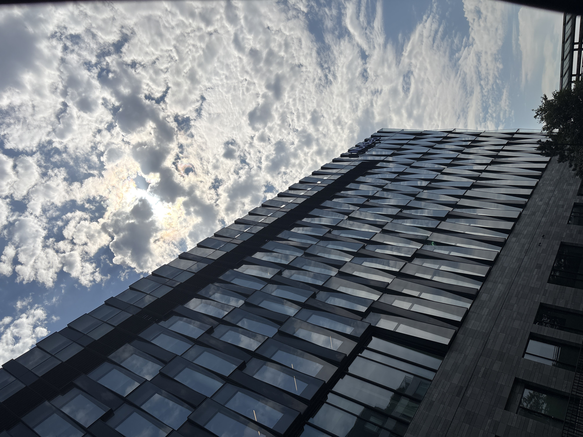 Copenhagen's Nordea tower shot from multiple angles on a cloudy afternoon