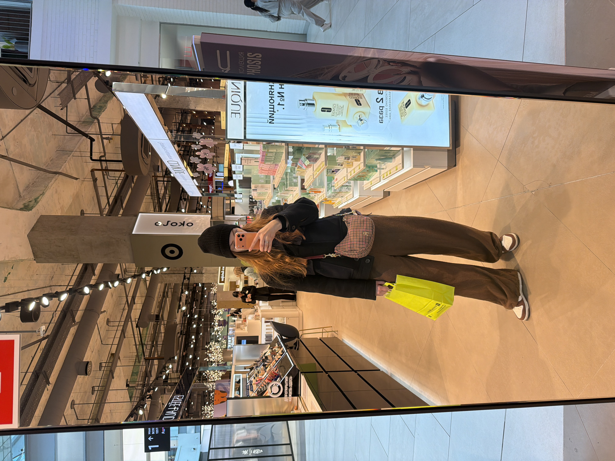 Woman films shopping selfies at Khimki mall Friday morning