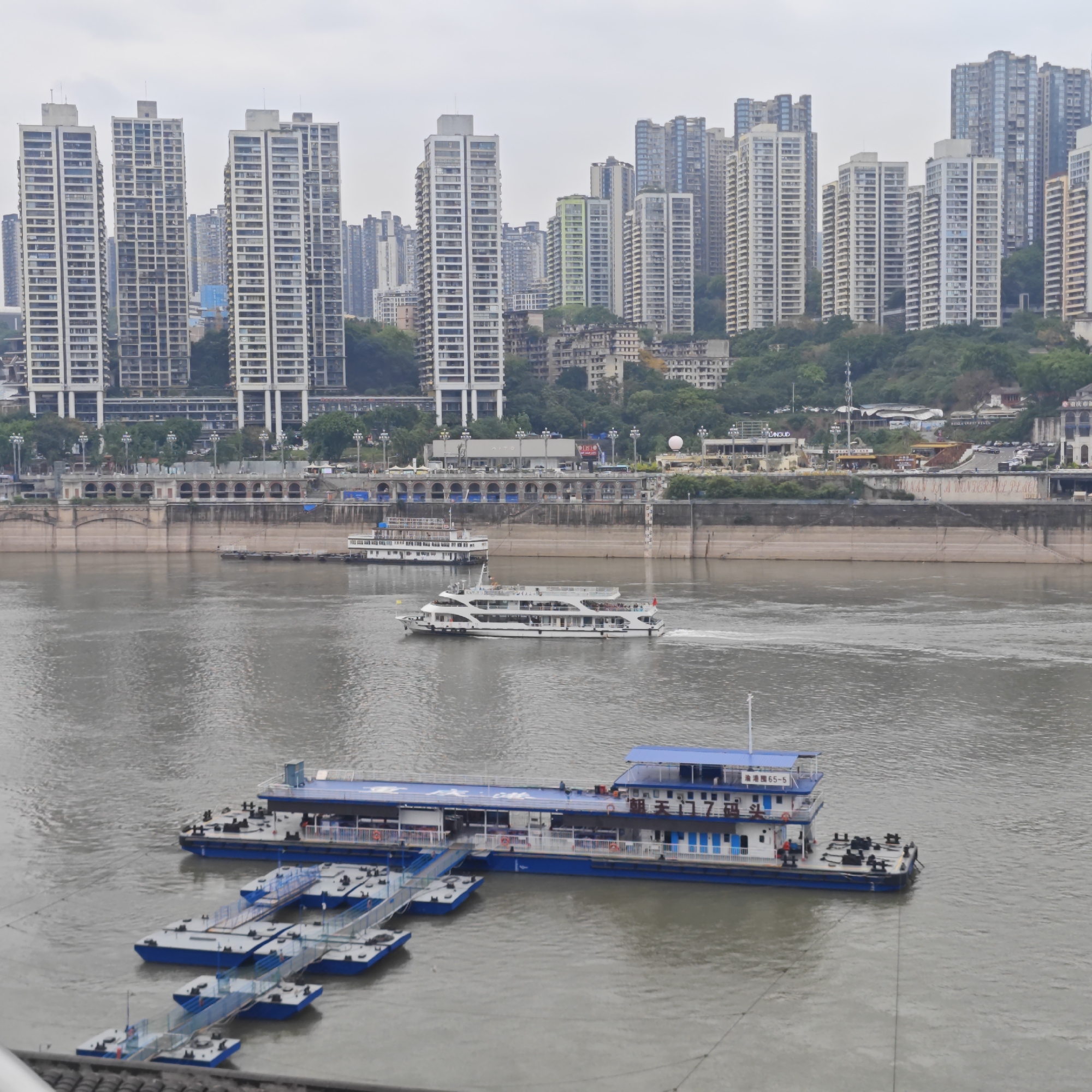 Morning activity captured along Chongqing's Jialing River waterfront